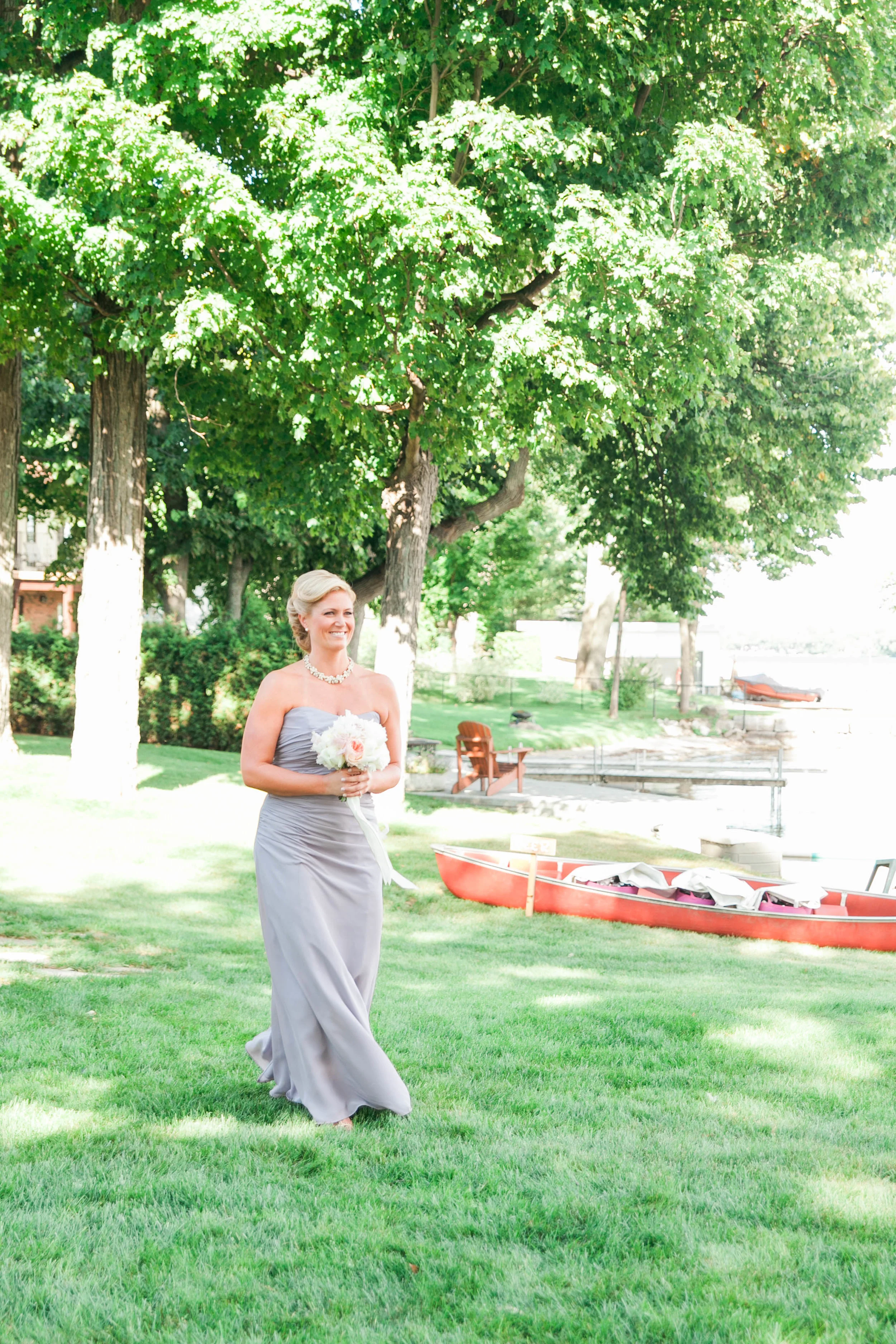 Maid of honour walking down aisle