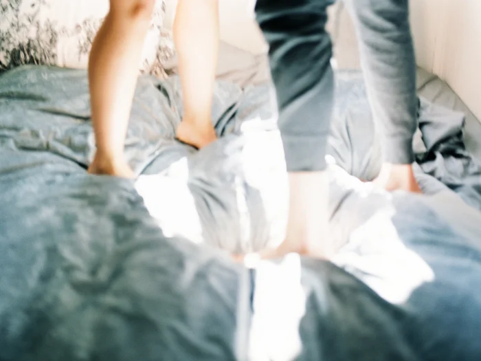 Couples in home engagement session.