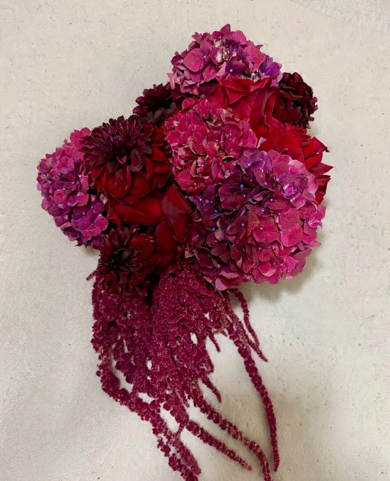 Jing Min&rsquo;s bouquet❤️

Layers of Hydrangea and Dahlia in rich wine and berry hues, woven through with velvety berry-toned Rose and finished with a soft cascade of Amaranthus.

Nothing excessive. 
Nothing competing. 

Just a bouquet that holds it