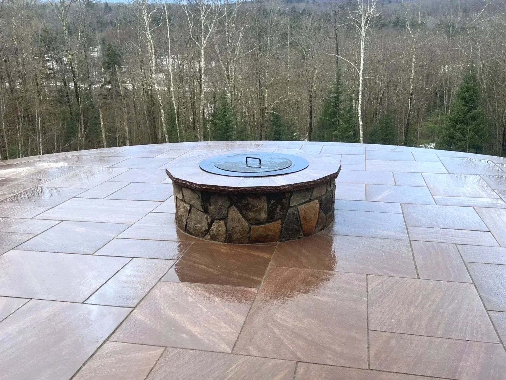 Natural stone fireplace in the mountains of Ludlow