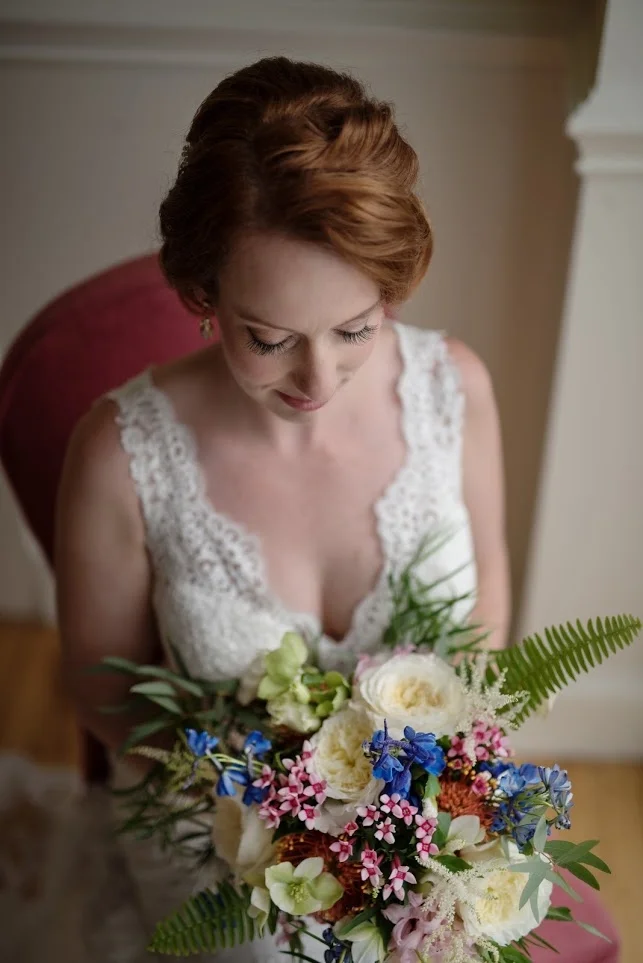 Our lovely Hope with her mid September wedding. In her bouquet are Patience Garden Roses, Blue Delphinium, White Astilbe, Pink Bouvardia and Hellabores. 