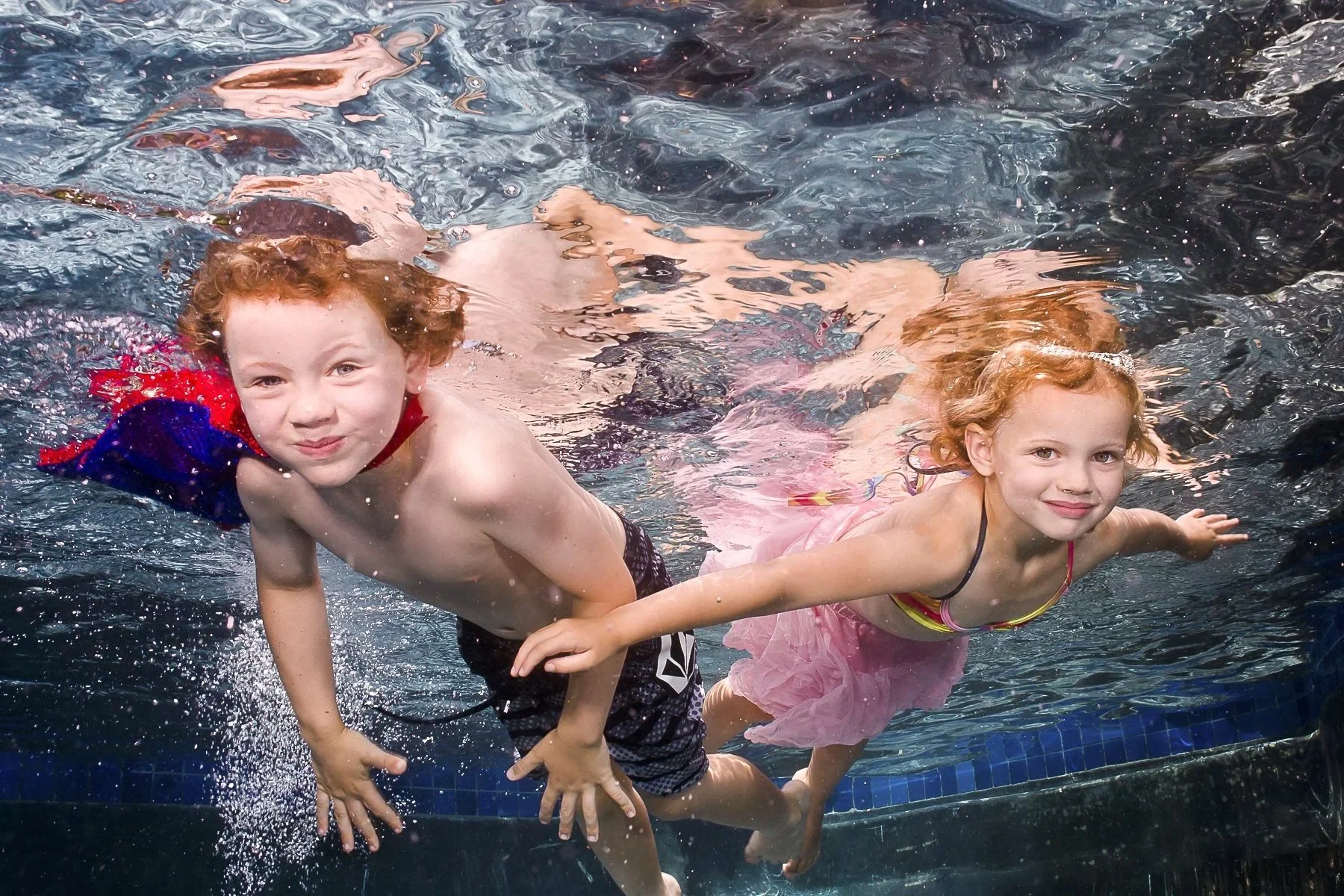 Why I photograph underwater sessions in your home pool