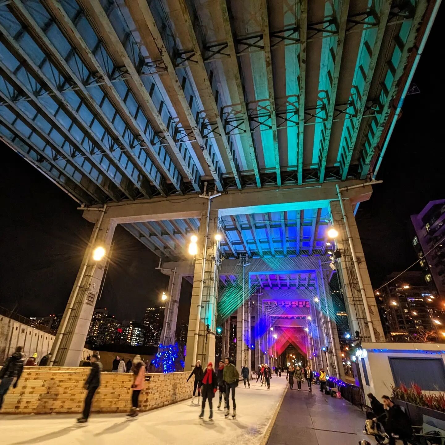 Back in Toronto, enjoying downtown night life. Today was my first time skating under the Bentway, lit up by beautiful colours of the &quot;Northern Lights&quot;. The free hot chocolate was a lovely bonus ☕

Skate rentals available.

Thanks Natalija a