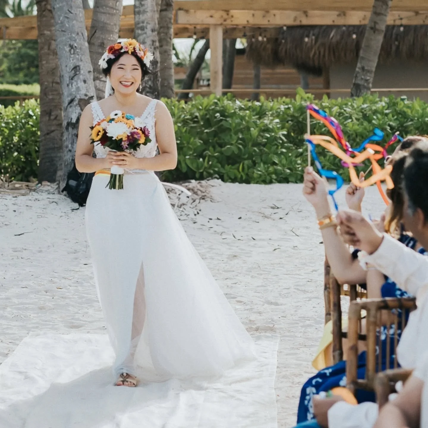 💖 Almost a year since our dream wedding, surrounded by loving family and friends🌴 

I thought I wouldn't care much about the details, but my colourful bouquet made me SO happy as I walked down the aisle (that lovely touch of blue!). Seeing Aman mad