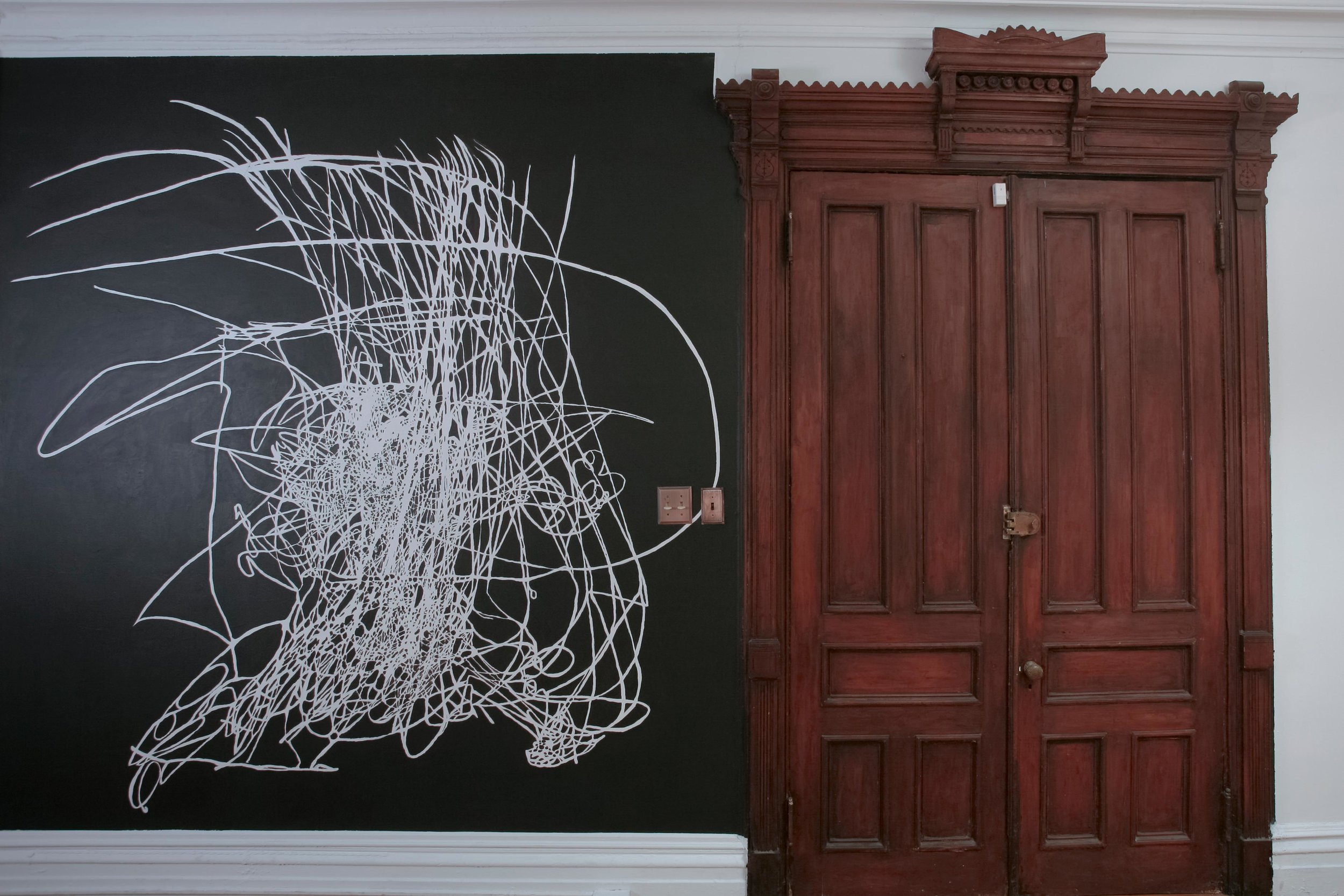 Morgan O'Hara, Sitespecific wall drawing: Morgan O’Hara. Source: Shu Yang Performing DRAG RED FLAG in Tokyo, Japan in 2002, 104 x 101 in., Flat black paint on white wall, 2017