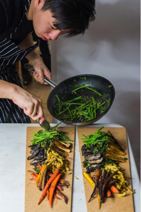 Lucas Sin cooking at Junzi Kitchen, photograph provided by Junzi Kitchen