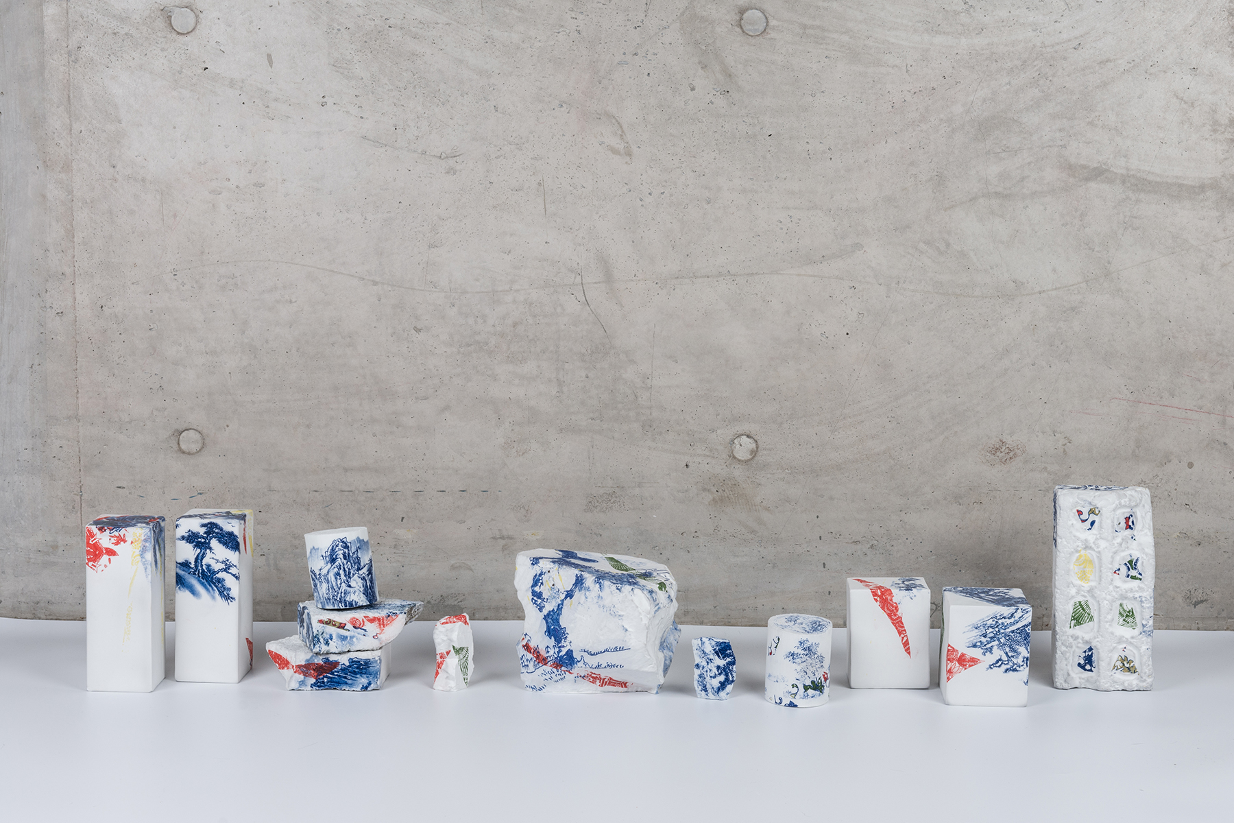   Landscapes Deconstruct I , 2018, Porcelain, fire to 1300C, gas reduction, Various dimension, 12 pieces © Renqian Yang, courtesy Fou Gallery. 
