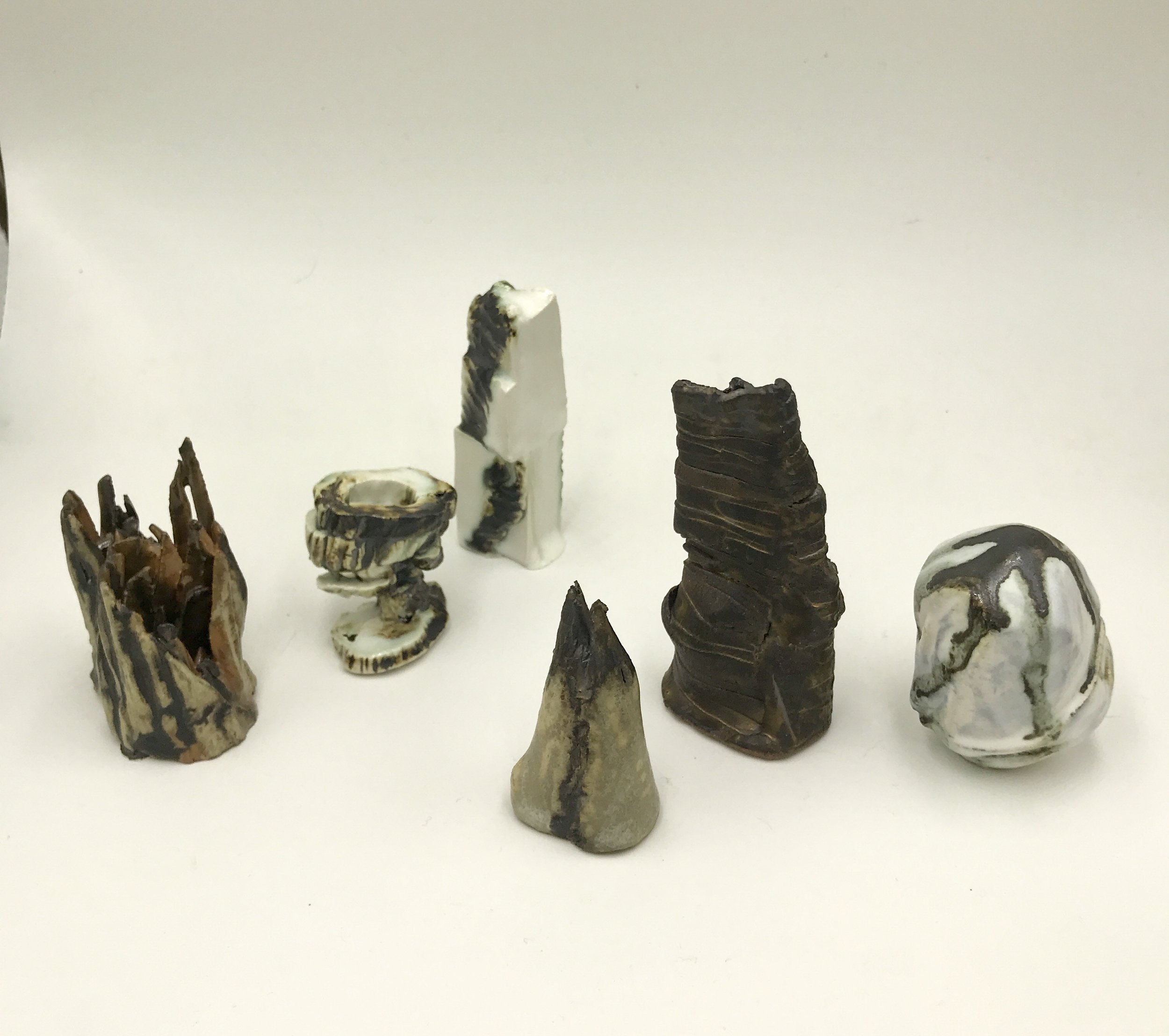  Hilda Shen,  Range of Mountains,  2014-2019. Glazed clay, a group of six, each around 2.75 x 2 x 2.25 inches, ©Hilda Shen, courtesy of Fou Gallery 