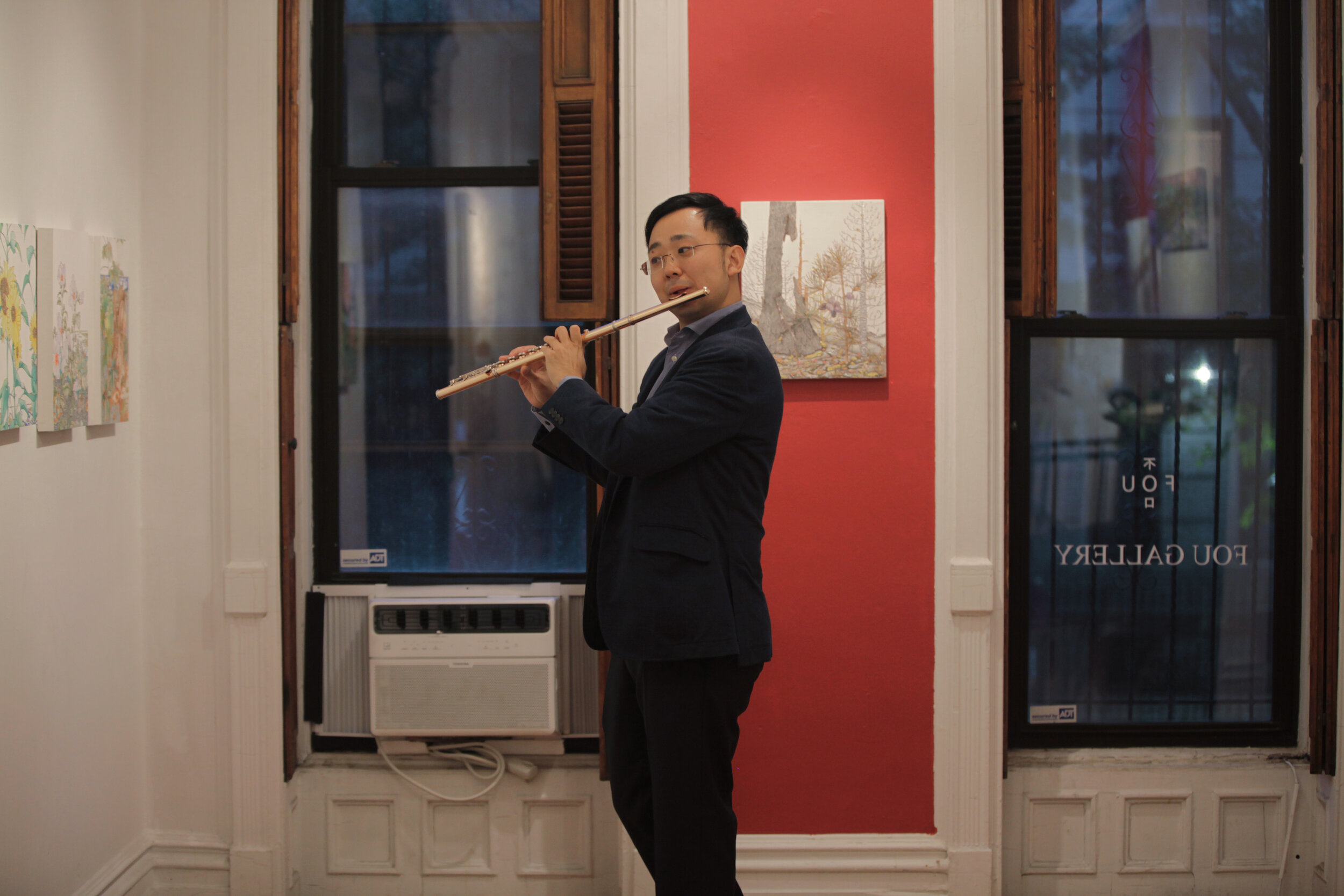   Zuoliang Liu Flute Recital at Present  at Fou Gallery, photo by Jingxin Hu, courtesy Fou Gallery. 