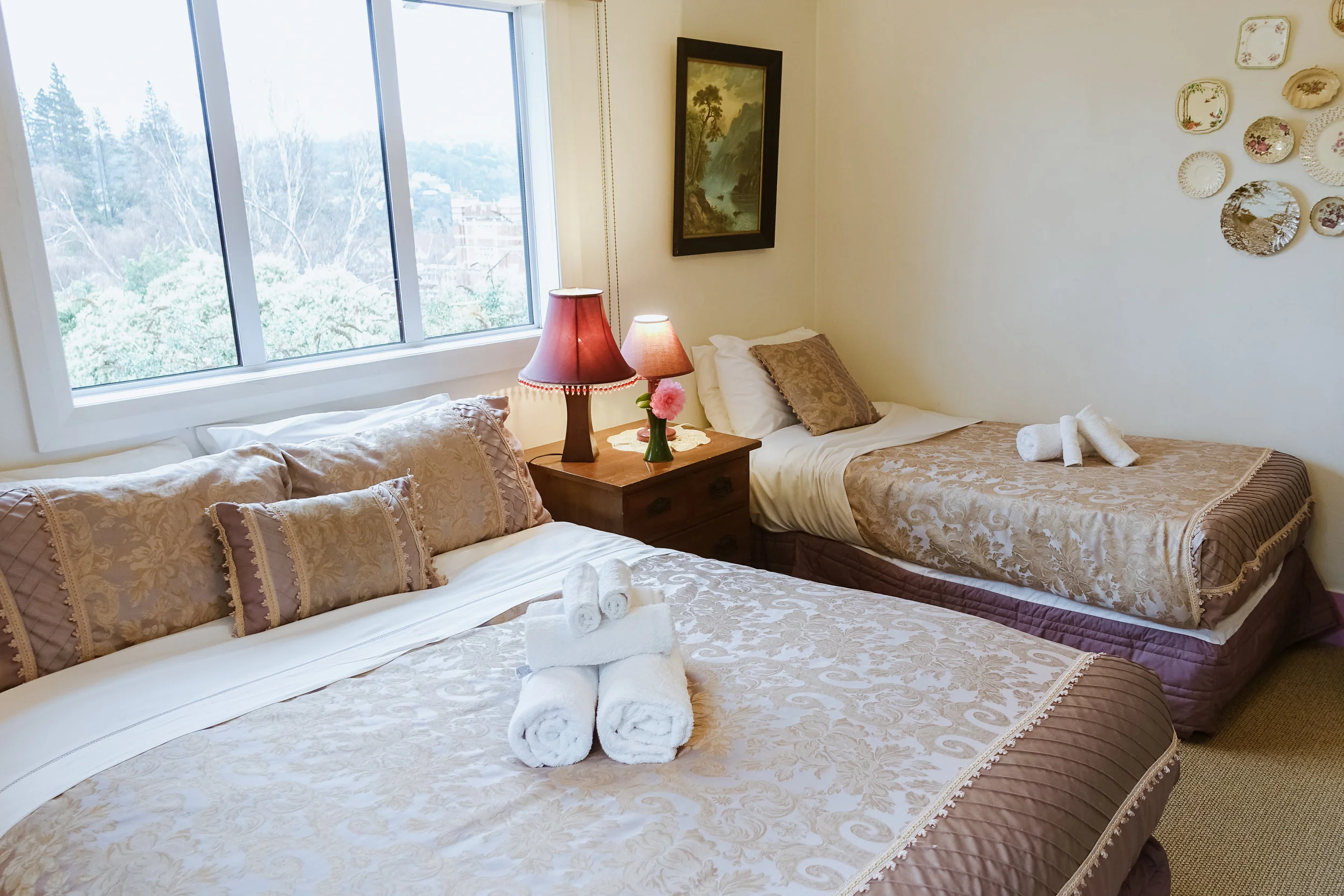 Beds in the Queen + Single room with ensuite bathroom