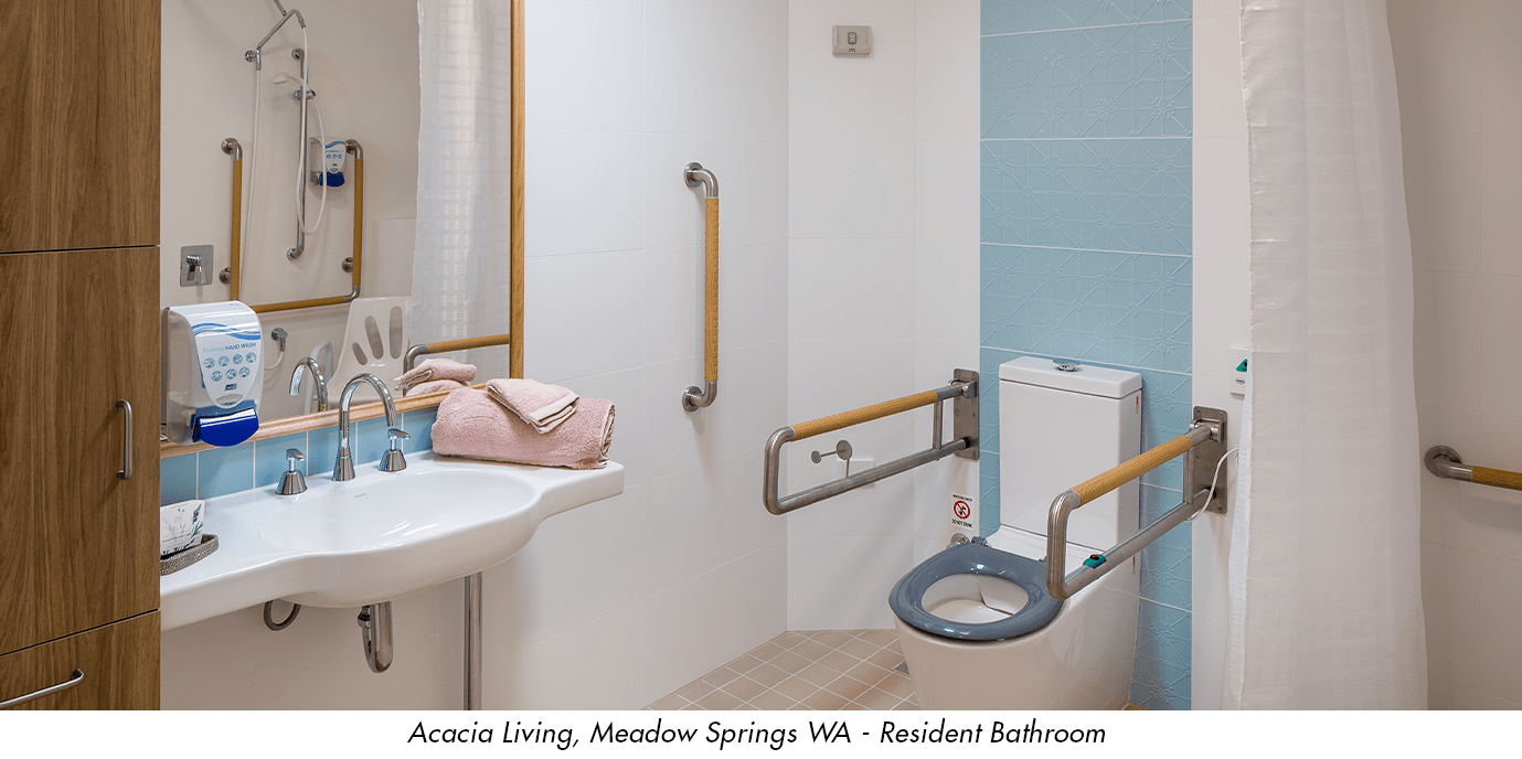 Acacia Meadow Springs Perth. Resident bathroom design with aged care grab rails and appropirate contrast on the wall tiles. 