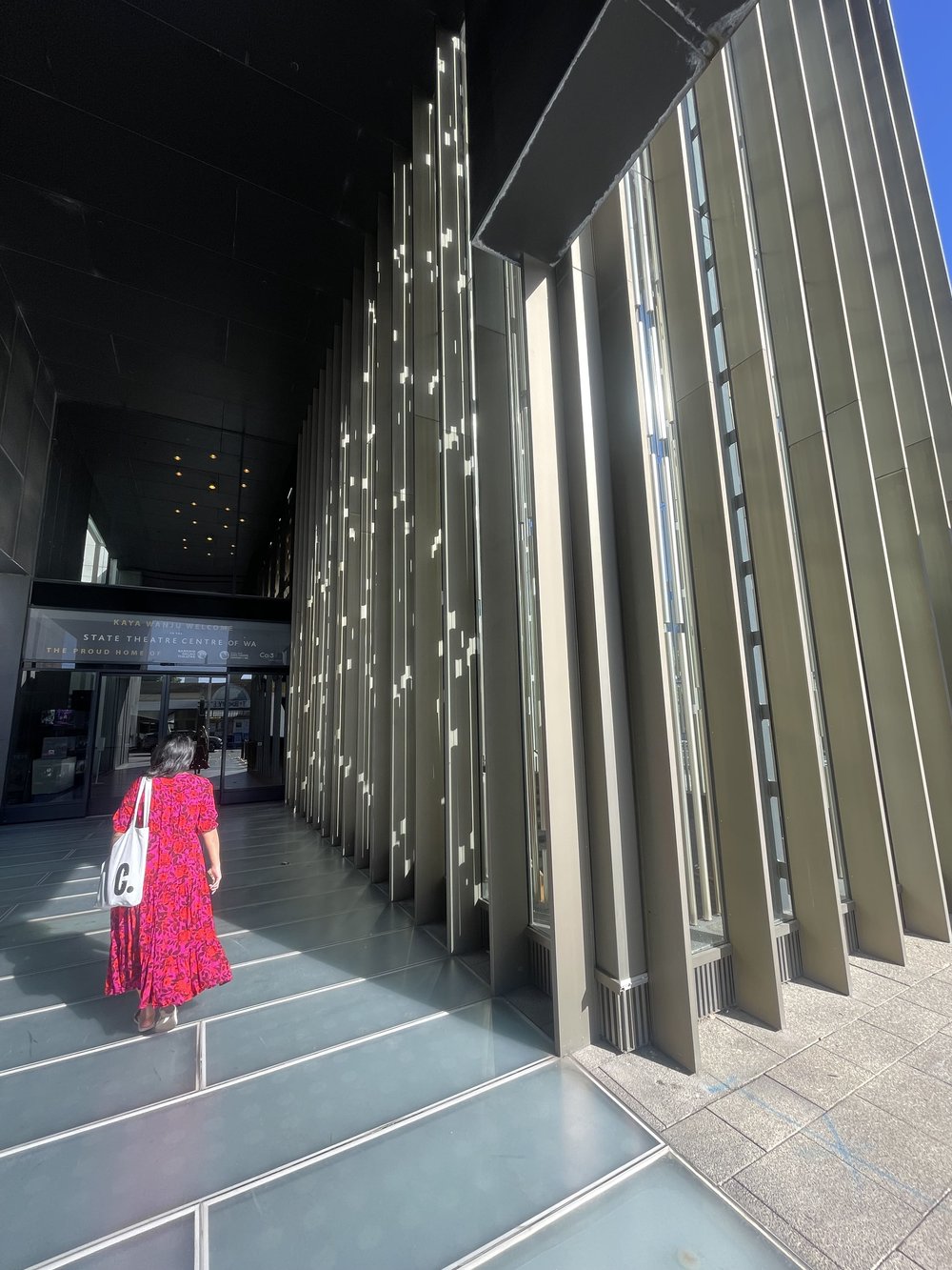 Christine outside the Heath Ledger Theatre Perth.