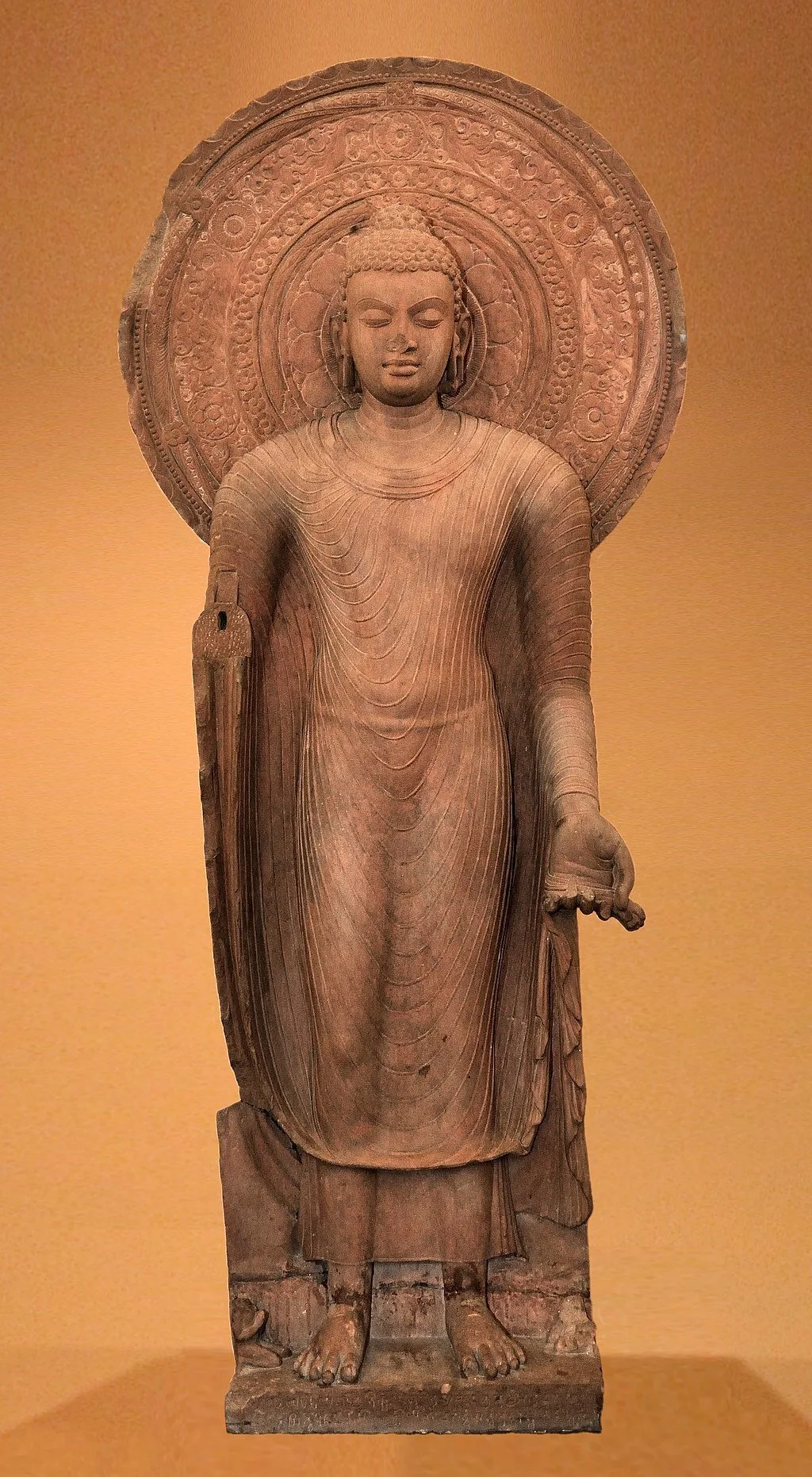 MA3 1024px-Standing_Buddha_Installed_by_Buddist_Monk_Yasadinna_-_Circa_5th_Century_CE_-_Jamalpur_Mound_-_ACCN_00-A-5_-_Government_Museum_Mathura_Golden_background.jpeg