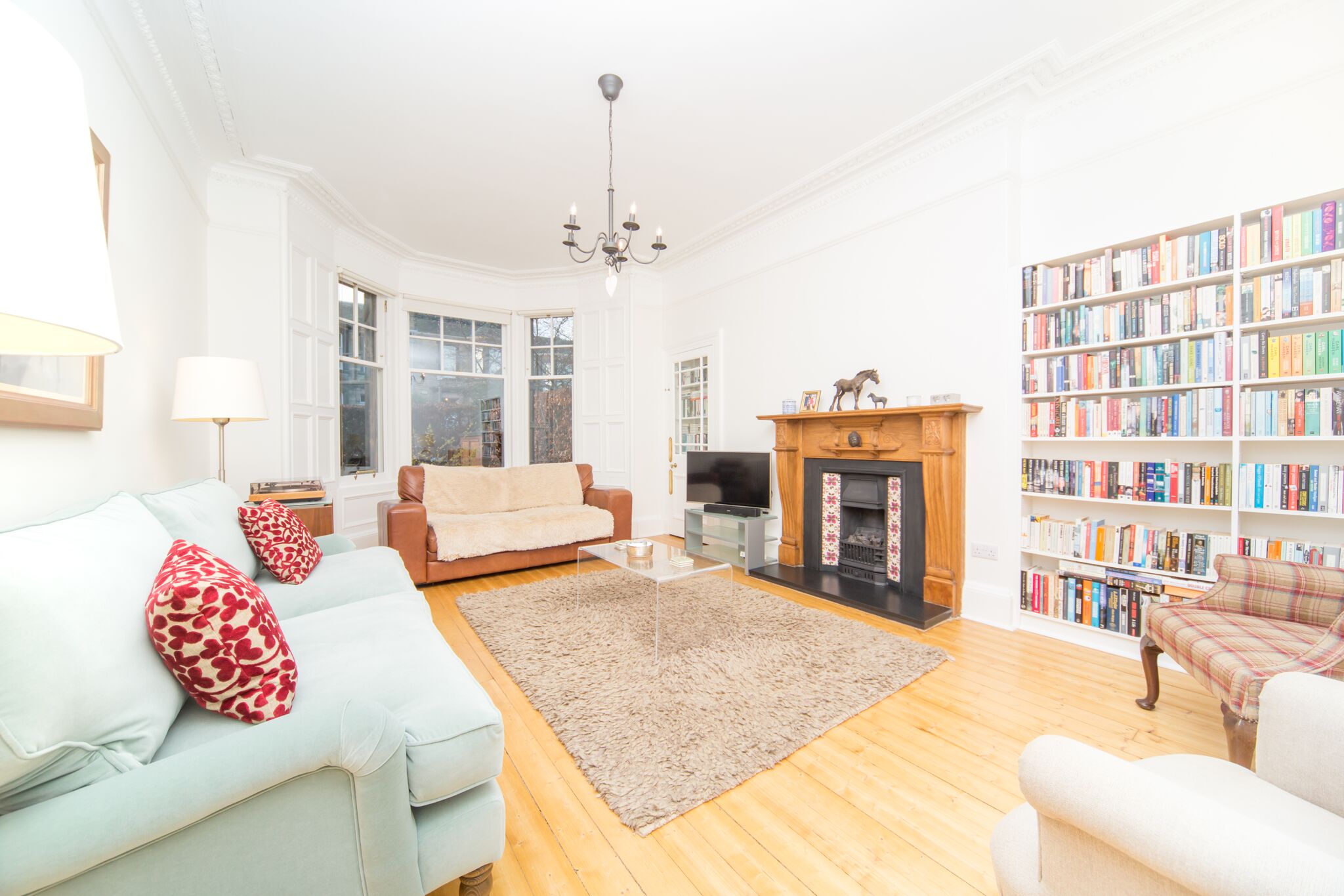 Maximise the space you have and make a statement wall with a built-in bookcase. Happy reading! #Dcmconstruction #edinburghjoinery #bookcasestyling.jpeg