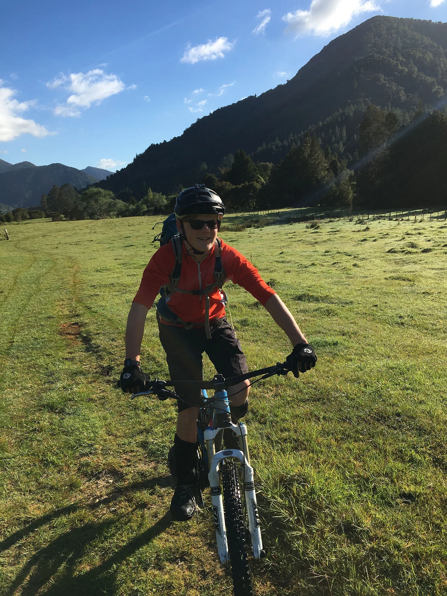 Zack making tracks in the early morning dew leading up to the 387 meter Kaiuma Saddle