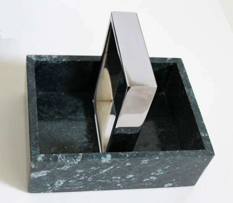 Small green marble with polished nickel handles.