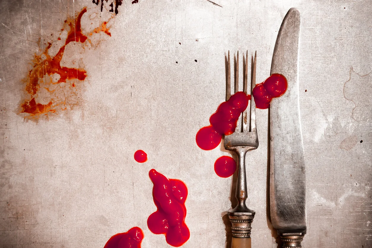 Knife-and-Fork-splattered-with-Ketchup-1037513954_1258x839.jpeg