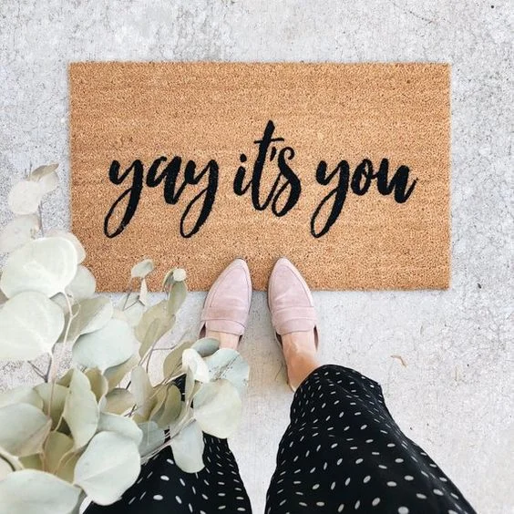There’s nothing like a new mat to freshen up the entry. Get this cute one from Etsy! If you’re feeling crafty, make your own! Hit up Michale’s for a plain mat and some black acrylic paint, print your stencil and voila - you’ve got yourself a one-of-a-kind entryway feature.