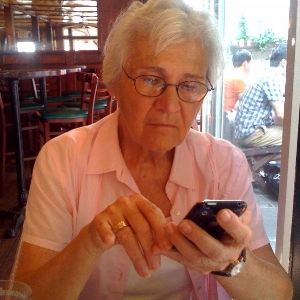 A mom using her iPhone.