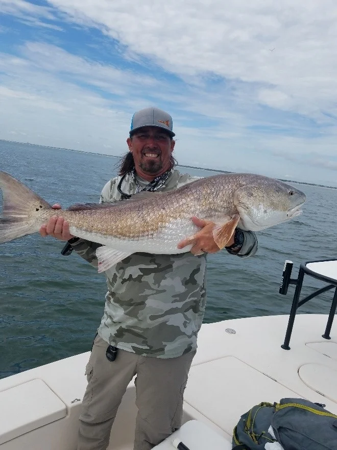 Captain Taylor huge bull red fish in Jacksonville