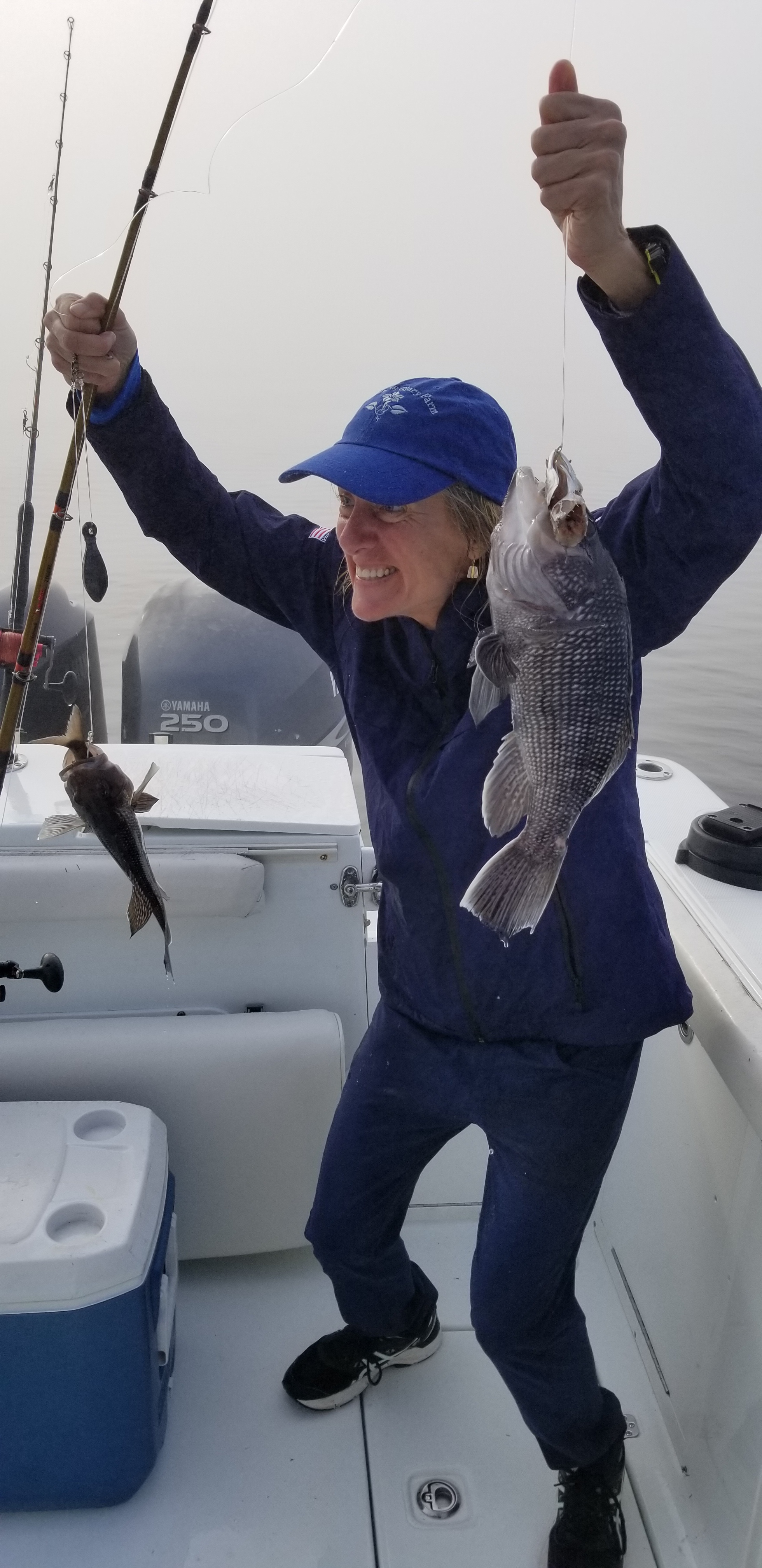 happy fisherman with grouper catch