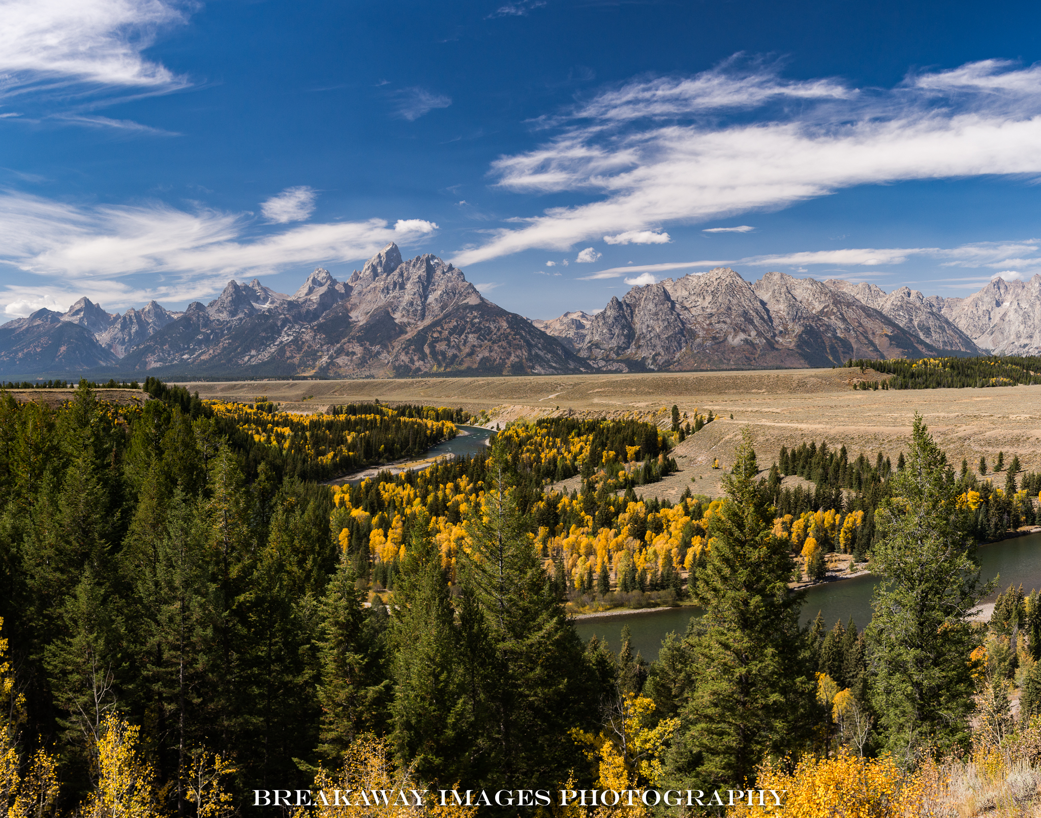 Grand Tetons and the Snake River photographed from where Ansel Adams made his iconic black and while image in 1941. The trees have grown so much that that image is no longer possible to recreate
