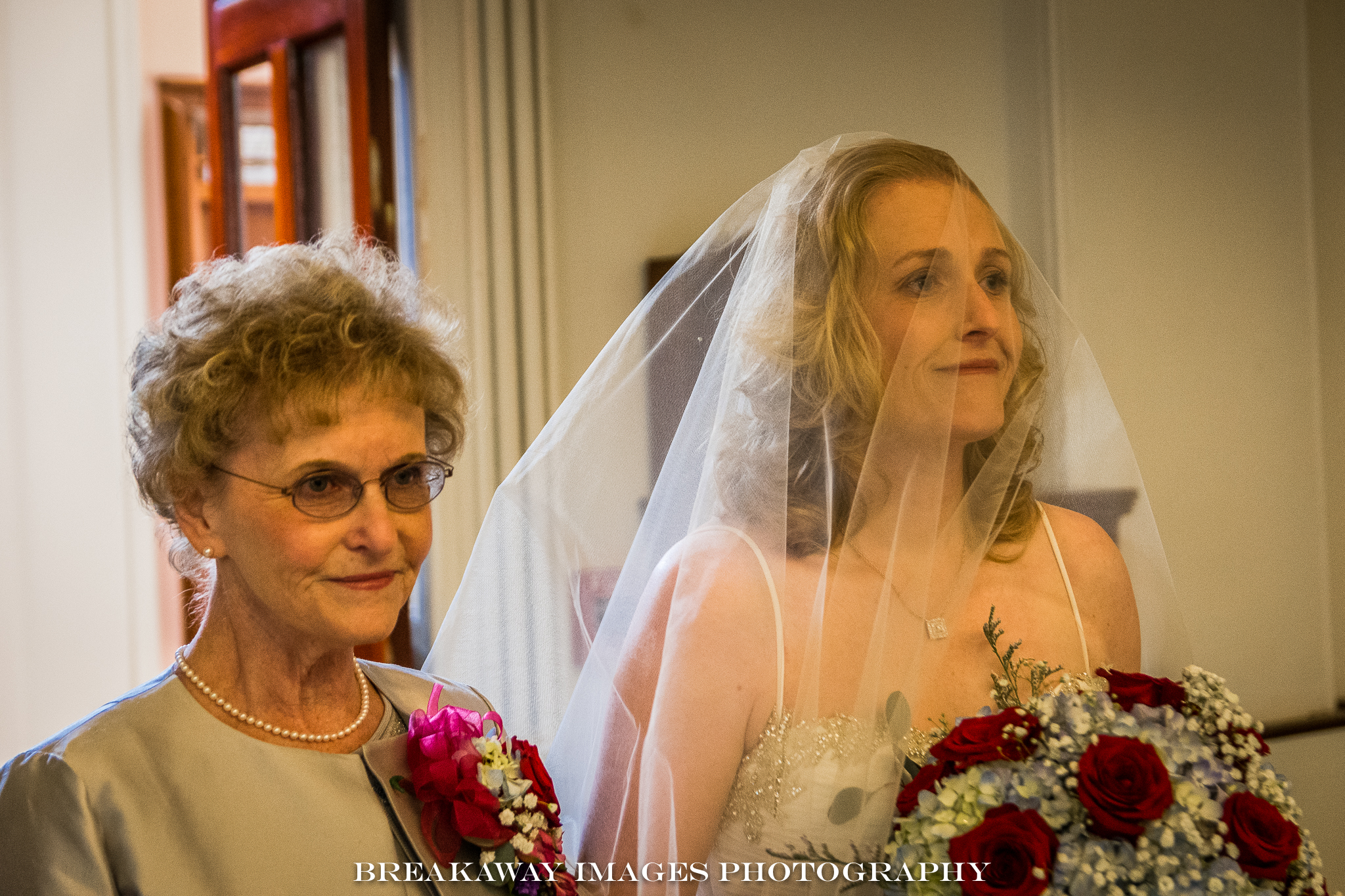 Kim's mom Marge, walking her up the aisle