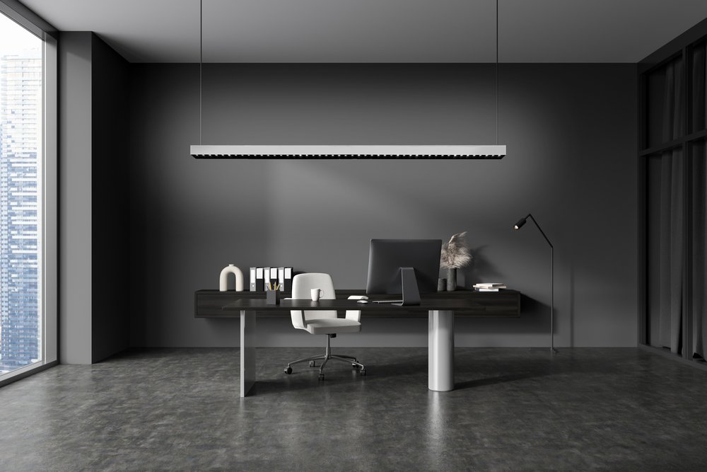 Modern linear lighting fixture used in private office.