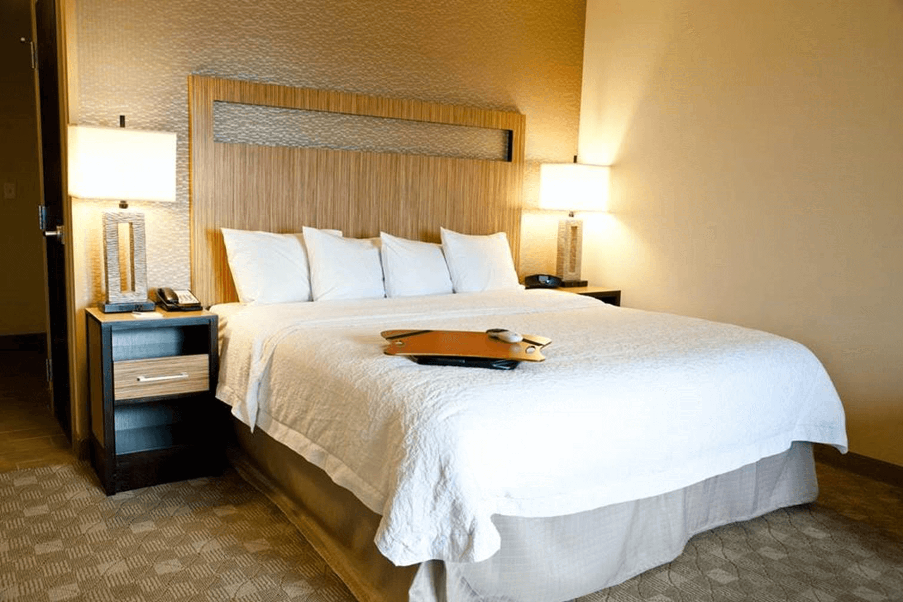  Hampton Inn and Suites Salinas room interior with king size bed 