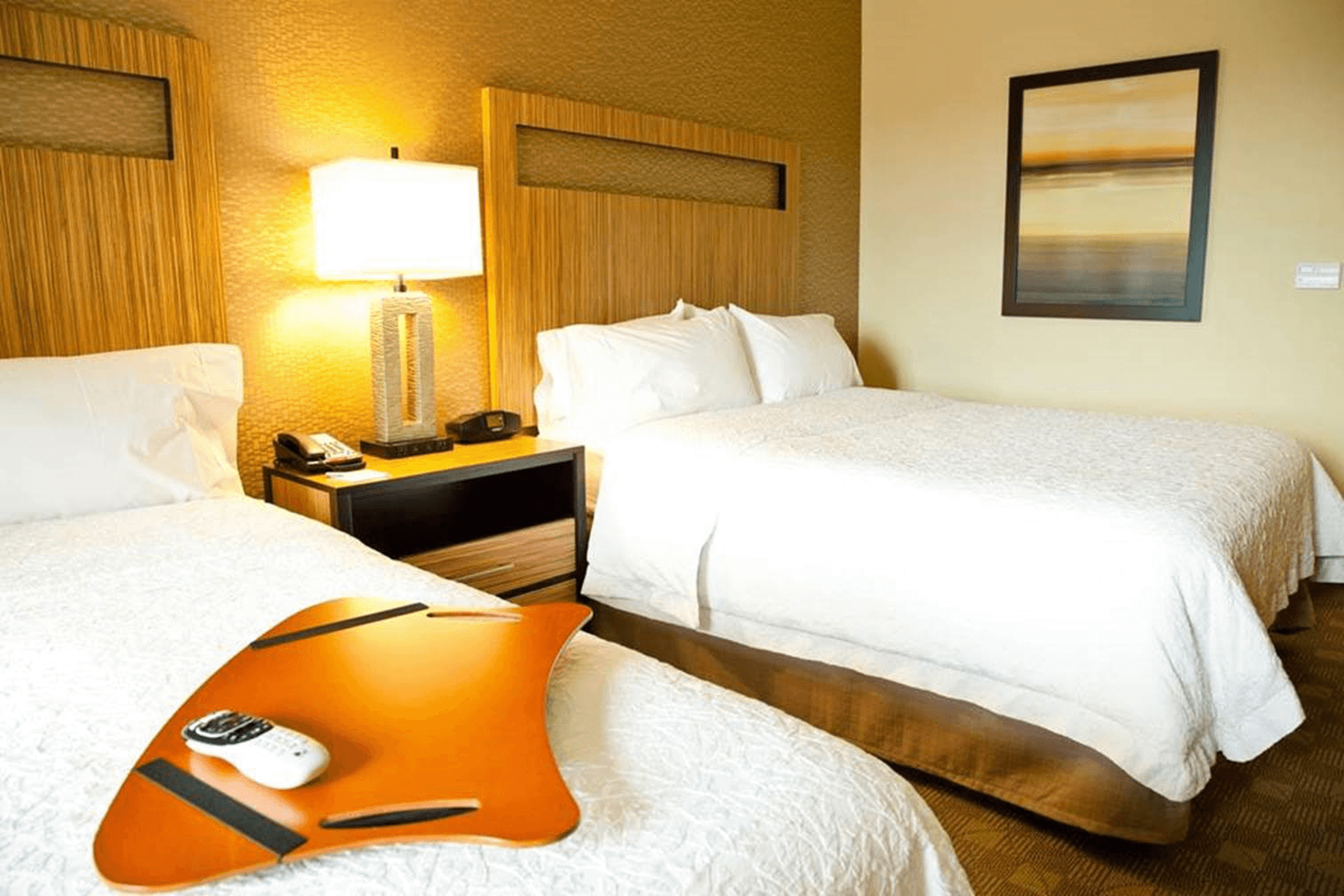  Hampton Inn and Suites Salinas room interior with two double beds 