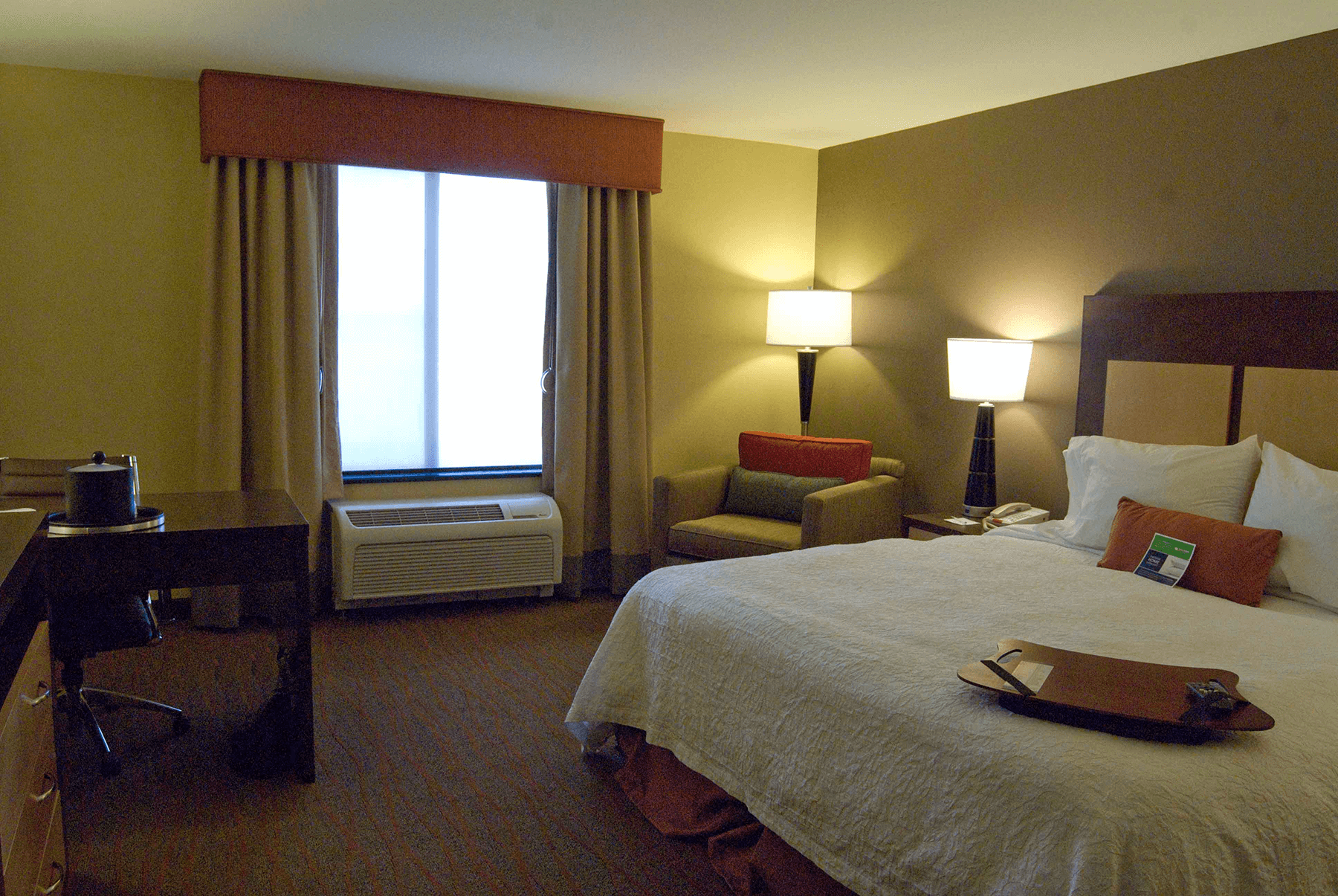  Hampton Inn and Suites Spokane room interior with king bed 