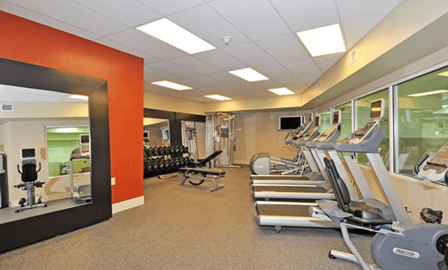  Homewood Suites fitness room interior with exercise machines 