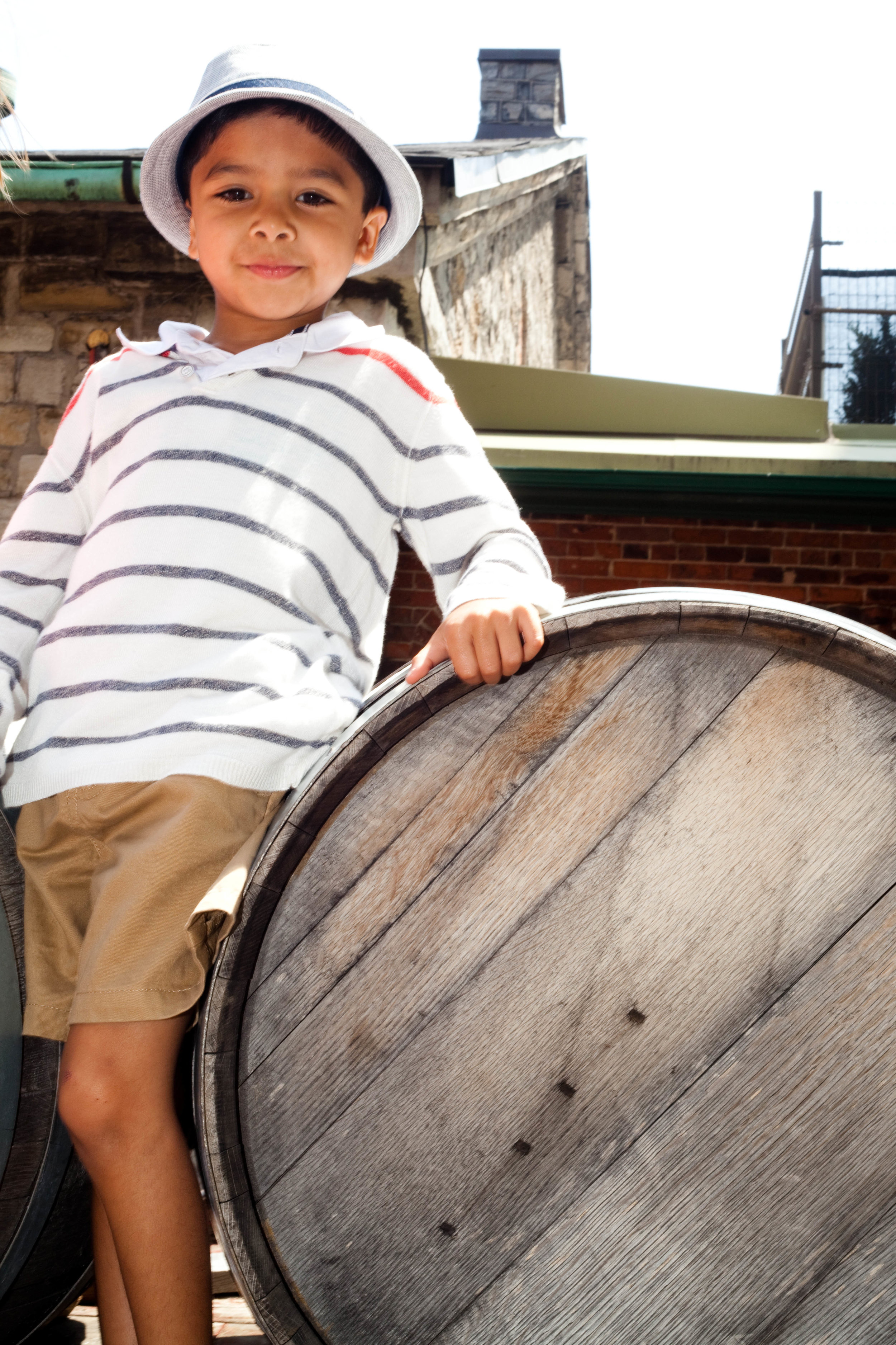 boy and a barrel