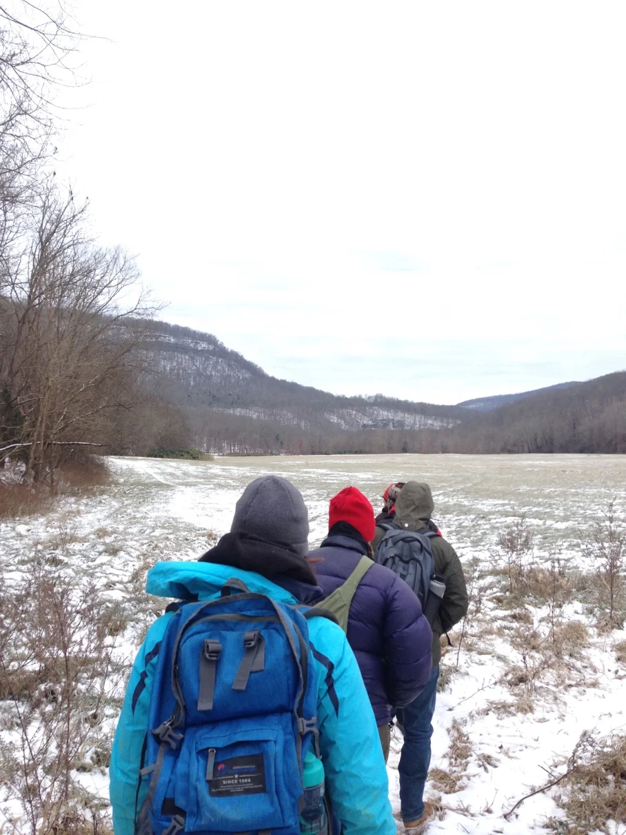 Hiking into Boxley Valley to collect OSL samples.