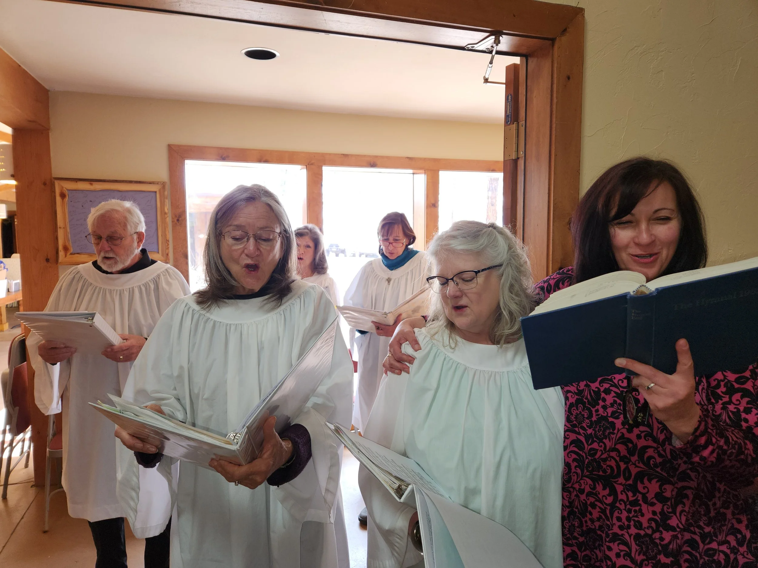 Parishioner singing with the choir