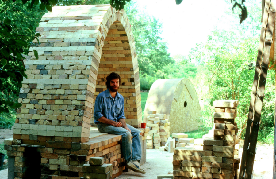 Here I am constructing my first salt glaze stoneware kiln in 1982.