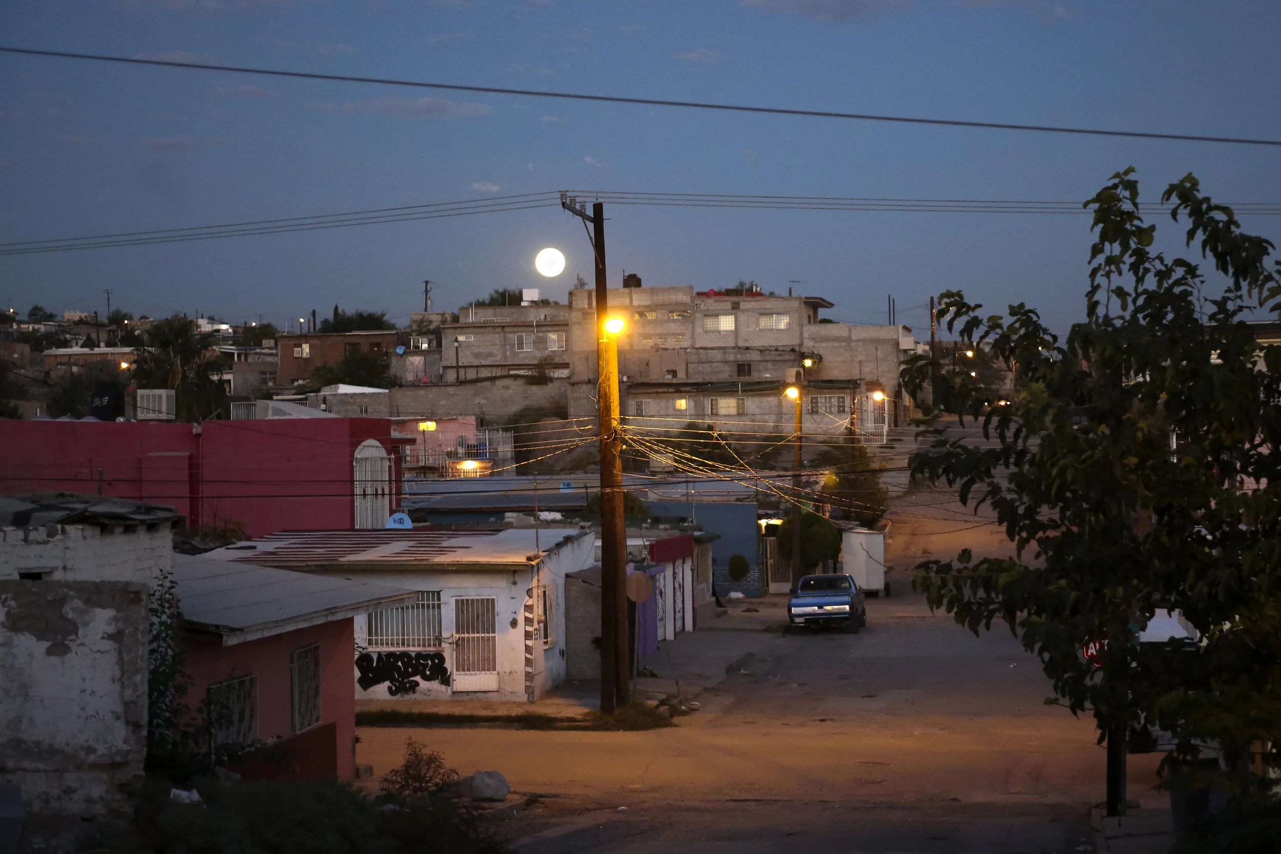 CIUDAD JUAREZ, CHIHUAHUA- Oct. 28, 2015: The moon sets during the early hours of the morning in the Colonia Alta Vista neighborhood of Ciudad Juarez. Miguel Gutierrez Jr. /KUT News.