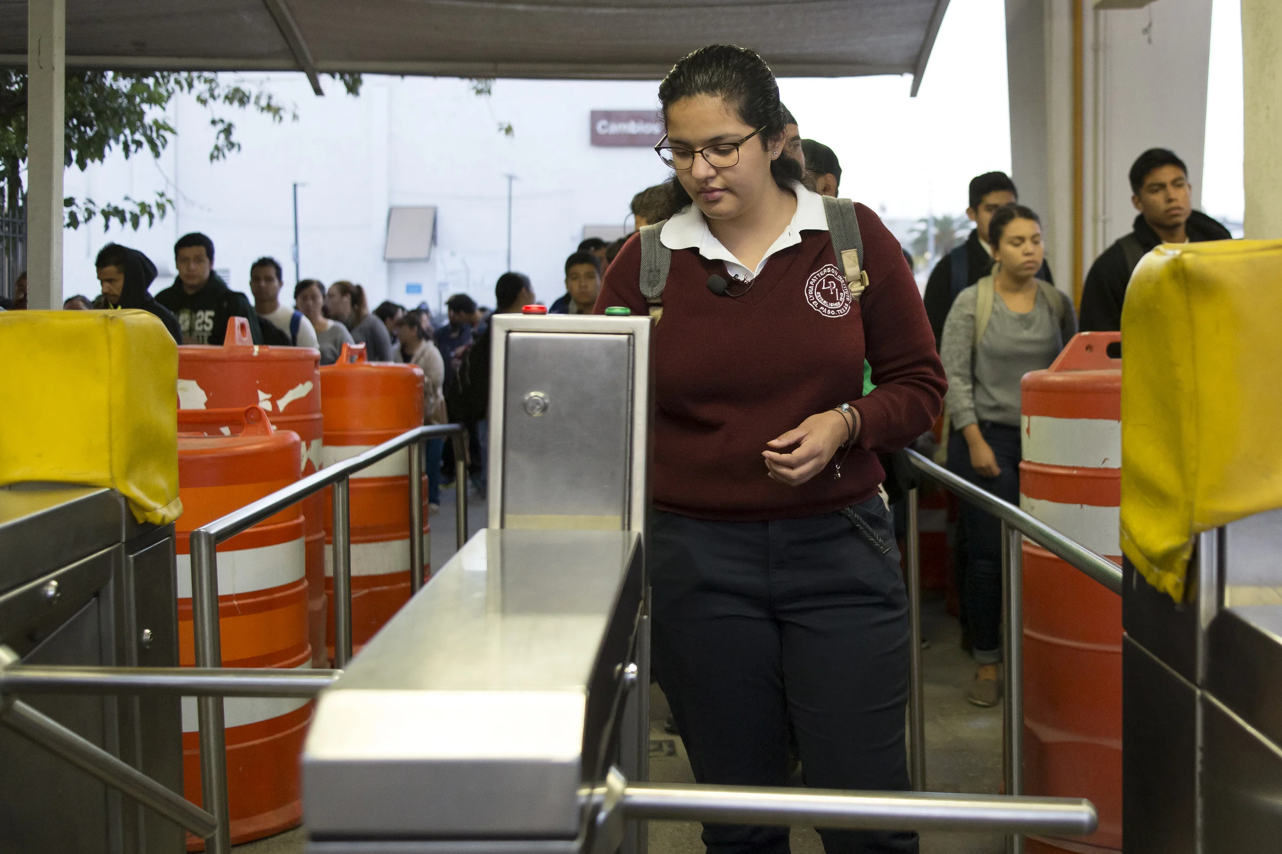 CIUDAD JUAREZ, CHIHUAHUA- Oct. 28, 2015: Arlet pays a 4 peso toll in order to exit Mexico and enter the international bridge towards Texas. "Today, there is a lot of line," Arlet says. Miguel Gutierrez Jr. /KUT News.