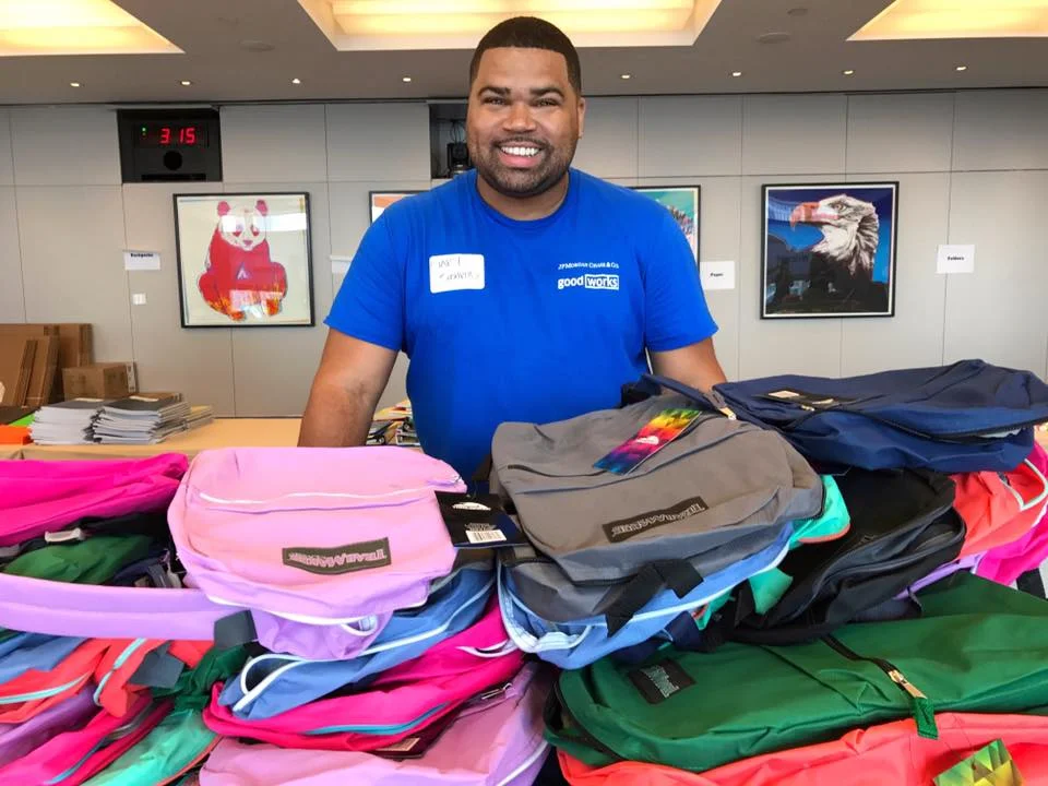 Gary Bushrod participated in the effort to pack over 6,000 backpacks for children in need all over the world.