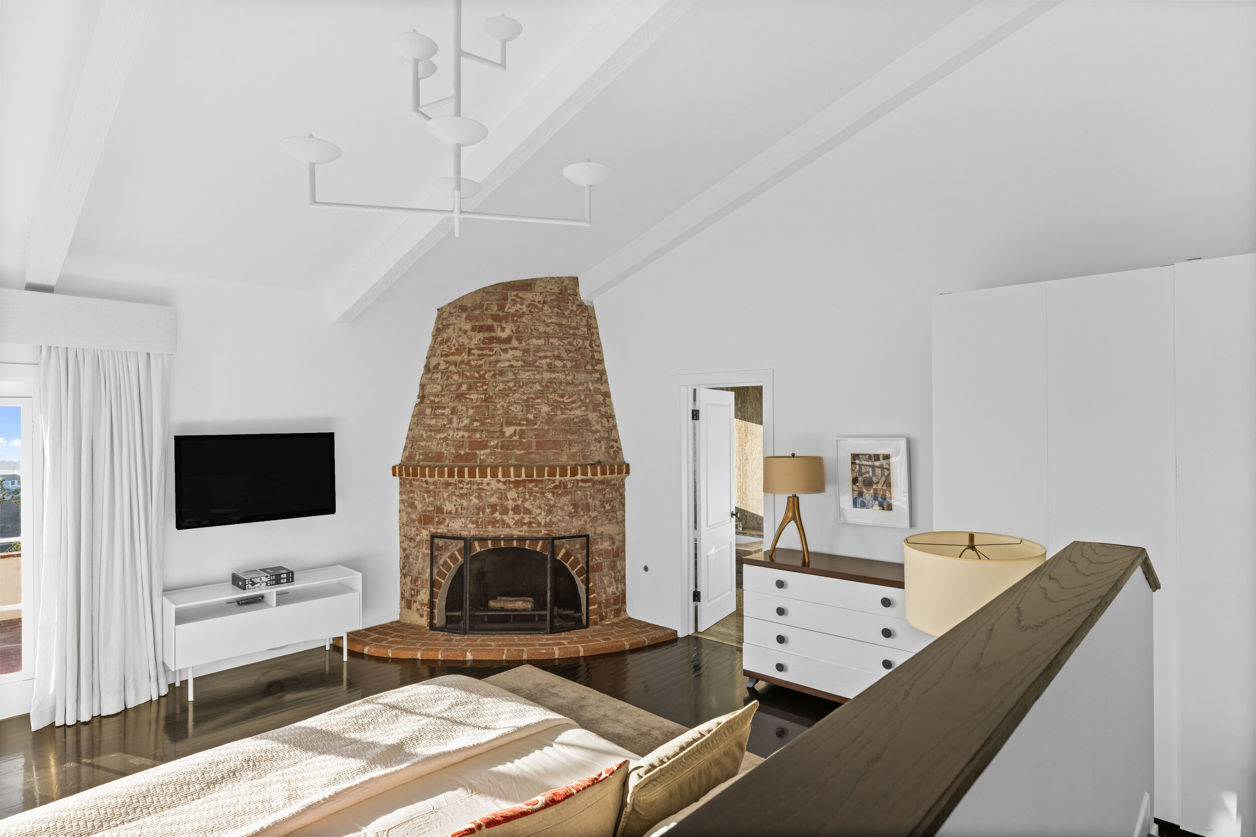 30 bedroom bannister wideshot to fireplace.jpg