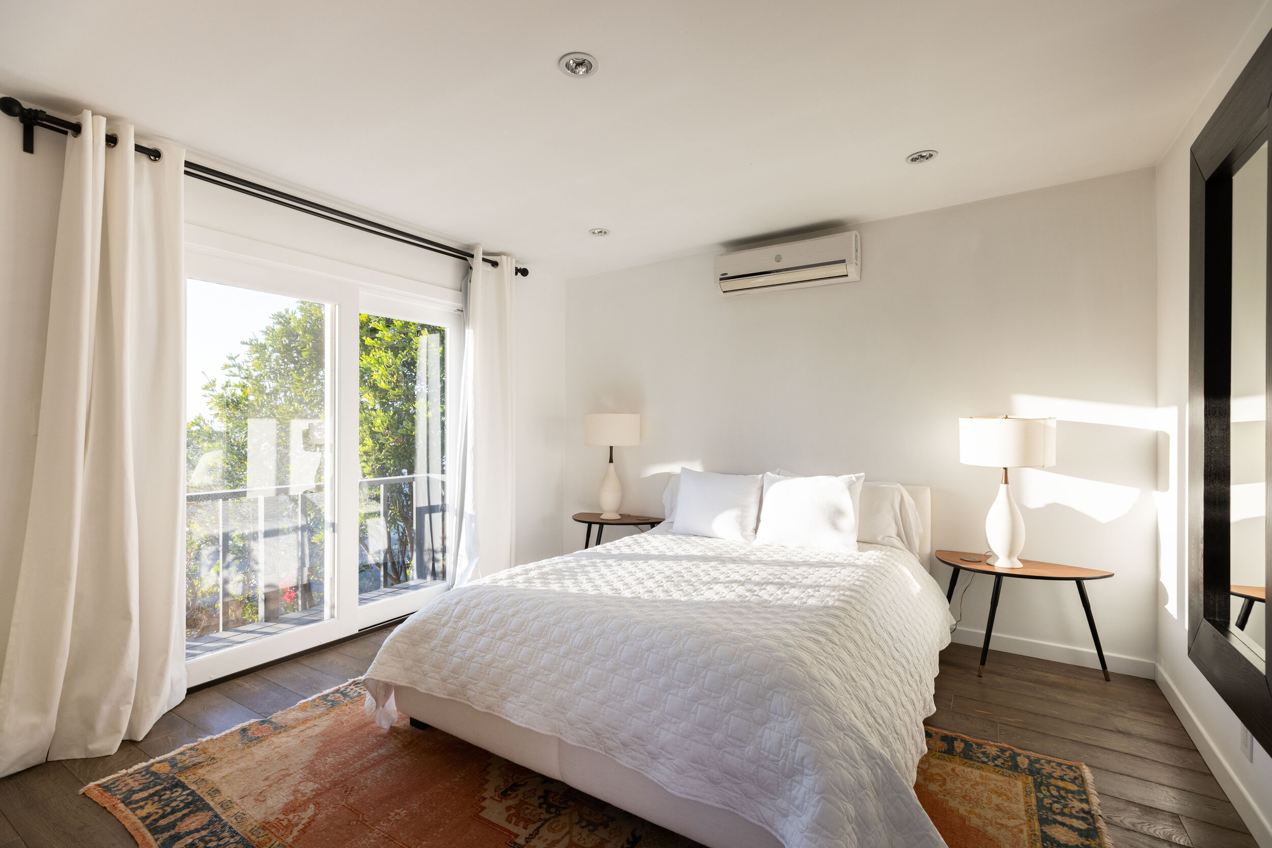 38 guest house bedroom windo view light REVISED.jpg