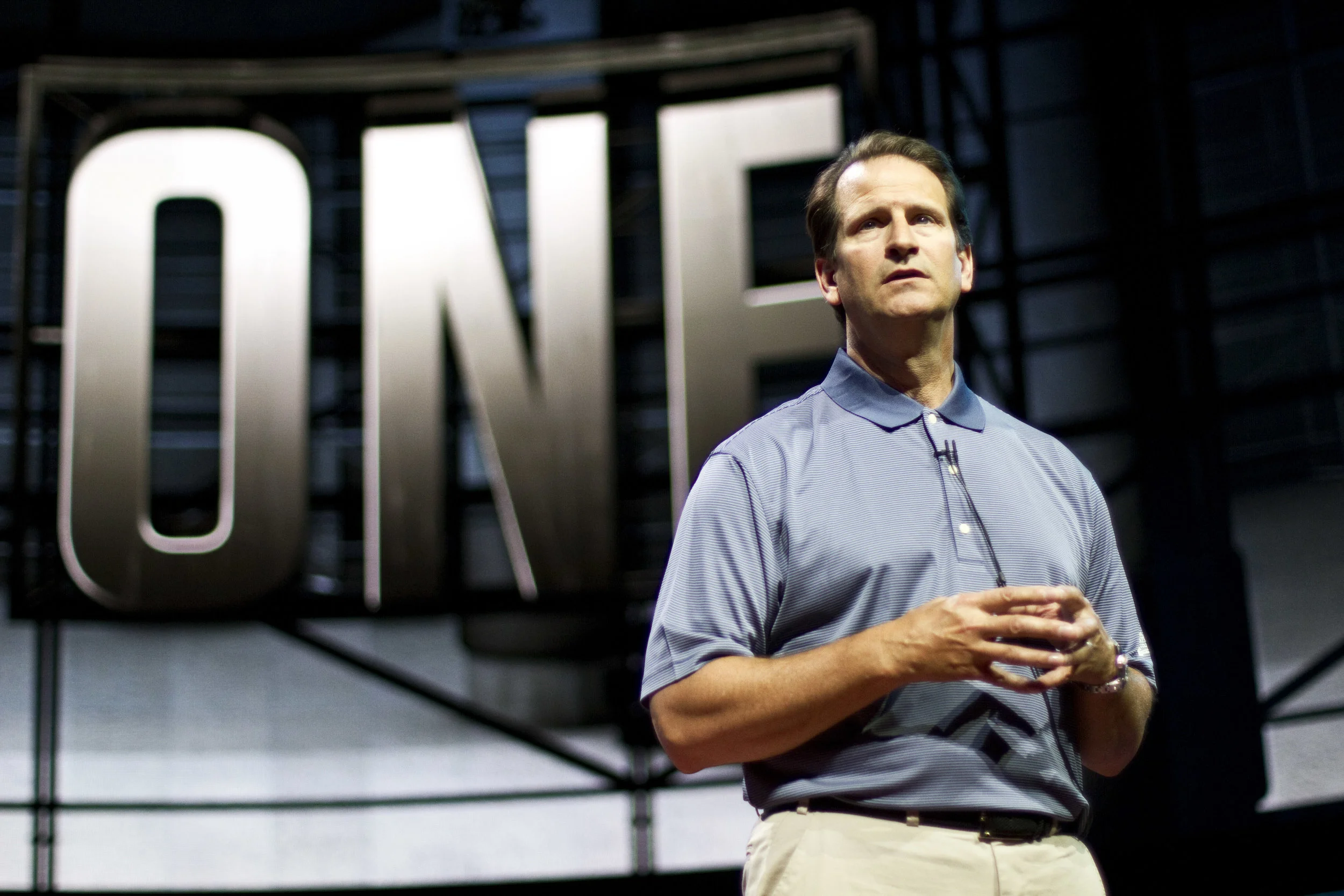 Man in blue golf shirt