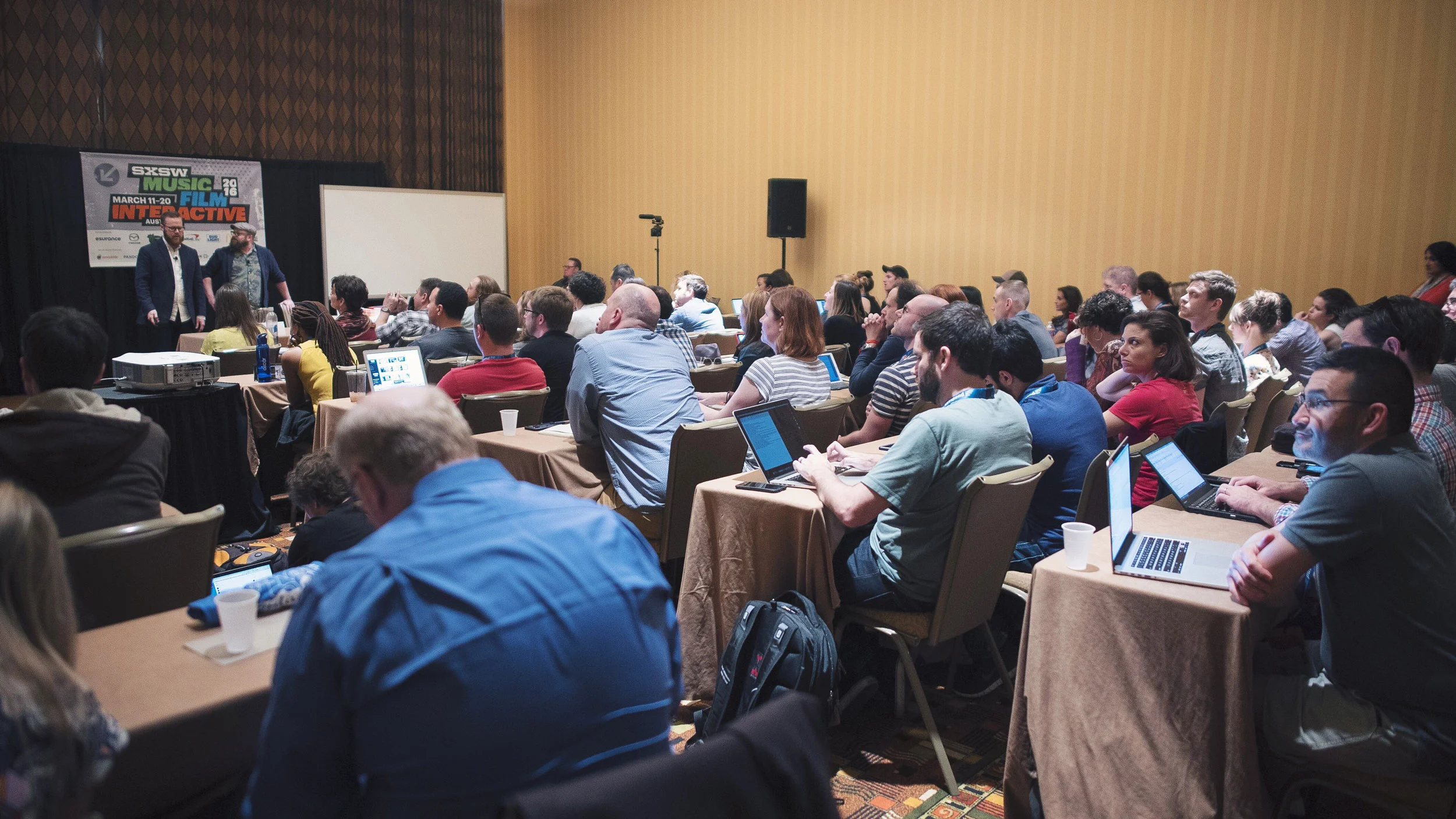 Message from SXSW 2016 attendee: "Hi Russell, I wanted to track you down and let you know how much I enjoyed--and have benefitted from-your Nudges seminar at SXSW this year. As you know, at SXSW you have about 100 choices per hour of things you can do. And then theres about 10 you want to do. And there's about 5 that you feel like you HAVE to do. When I read the synopsis, I knew that I had to get in to Nudges. I even showed up early to make sure I cleared the wait list. And I'm really glad I did. Of all the things I attended this year, Nudges gave me something I could go back to the agency and use immediately. Like on Monday. We happened to be in the middle of a site refresh and I basically pulled everyone together and told them that this was going to be the new filtration system. And we have used the process you laid out for us pretty much continually since then. You guys did such an amazing job of introducing the concept of tiny pushes and then allowing participants to break into small groups and put them to work. Many of the nudges seem obvious. But in the chaos of trying to get a site done, it's easy to just fly by the seat of your collective pants. Having this methodology almost serves as a check list as we walk through the process. Is there something we're missing here? What are we leaving out? How does it address the pain points of the user we have unanimously agreed upon? I am hoping you'll do a 2.0 version in 2017. I would pay the whole price of admission just to see it. Well, that and the fashion bloggers, of course. People in these seminars are so distracted and so over-booked that they tend to just wander out the door afterwards. I wanted to make sure you knew that you made a real difference for me--and my team." -Hal Brice