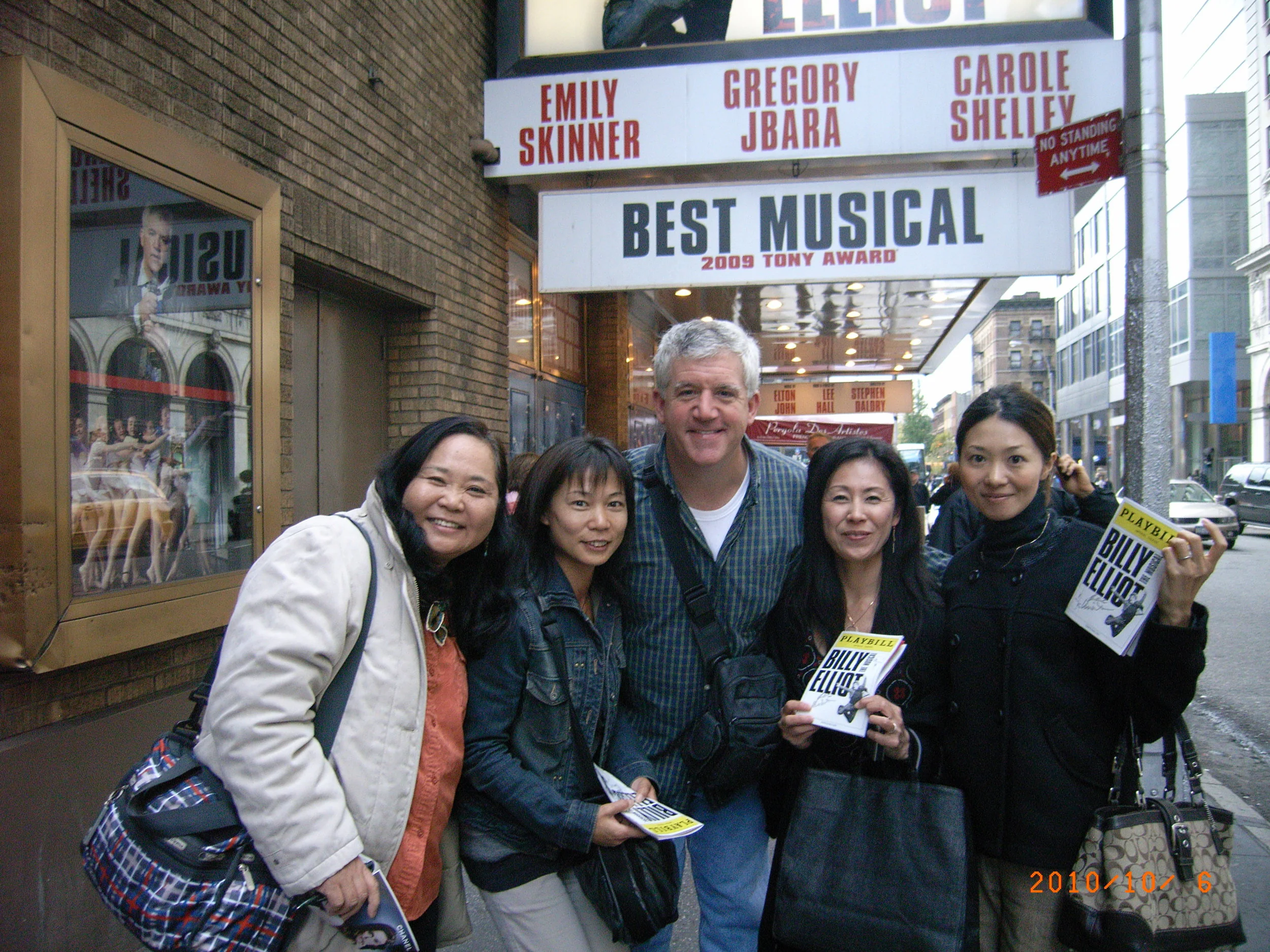 I need help identifying the lovely ladies in this photo with me takenNovember of 2010