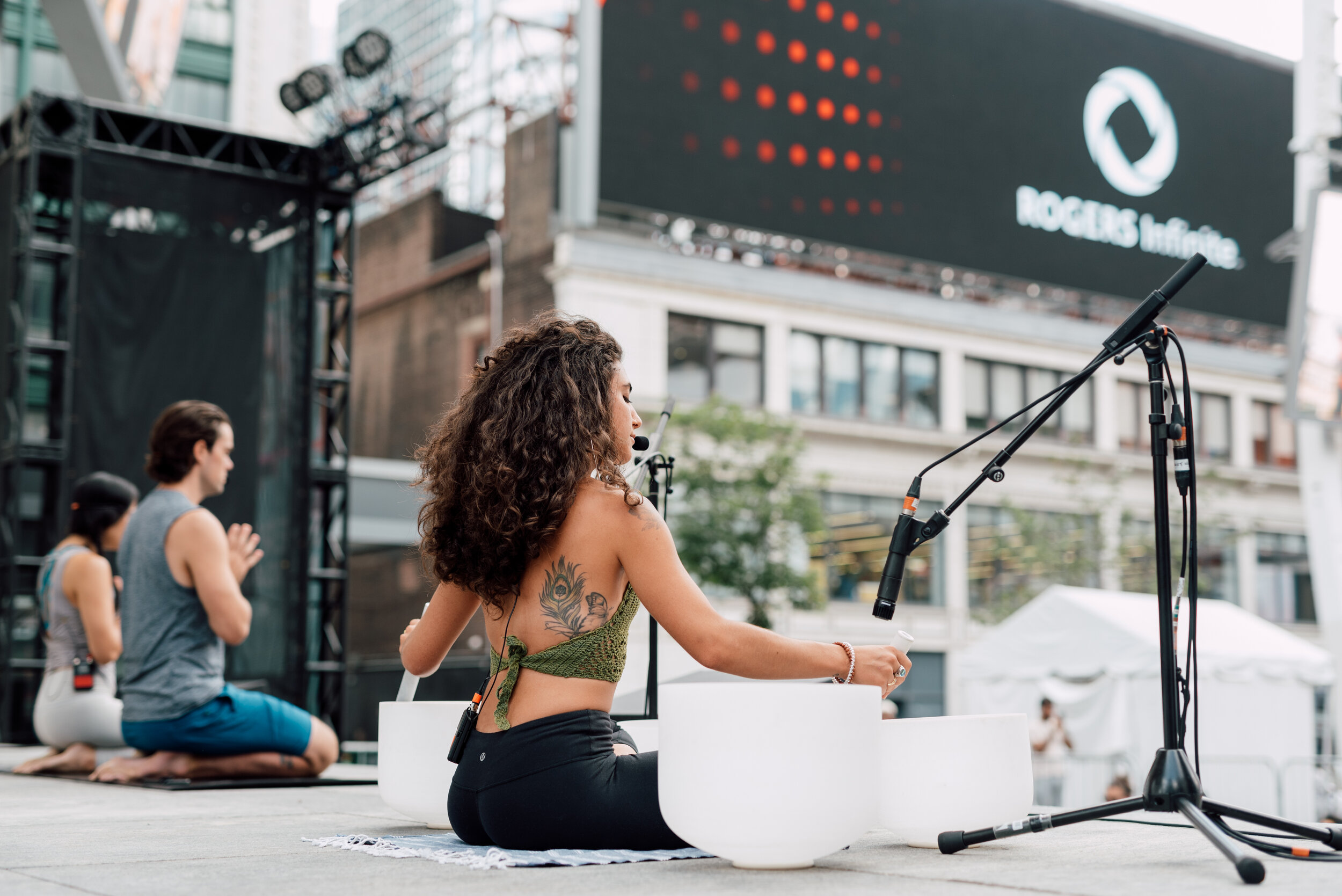 Theonlyalexandria performing Sound bath and Yoga at Dundas Square