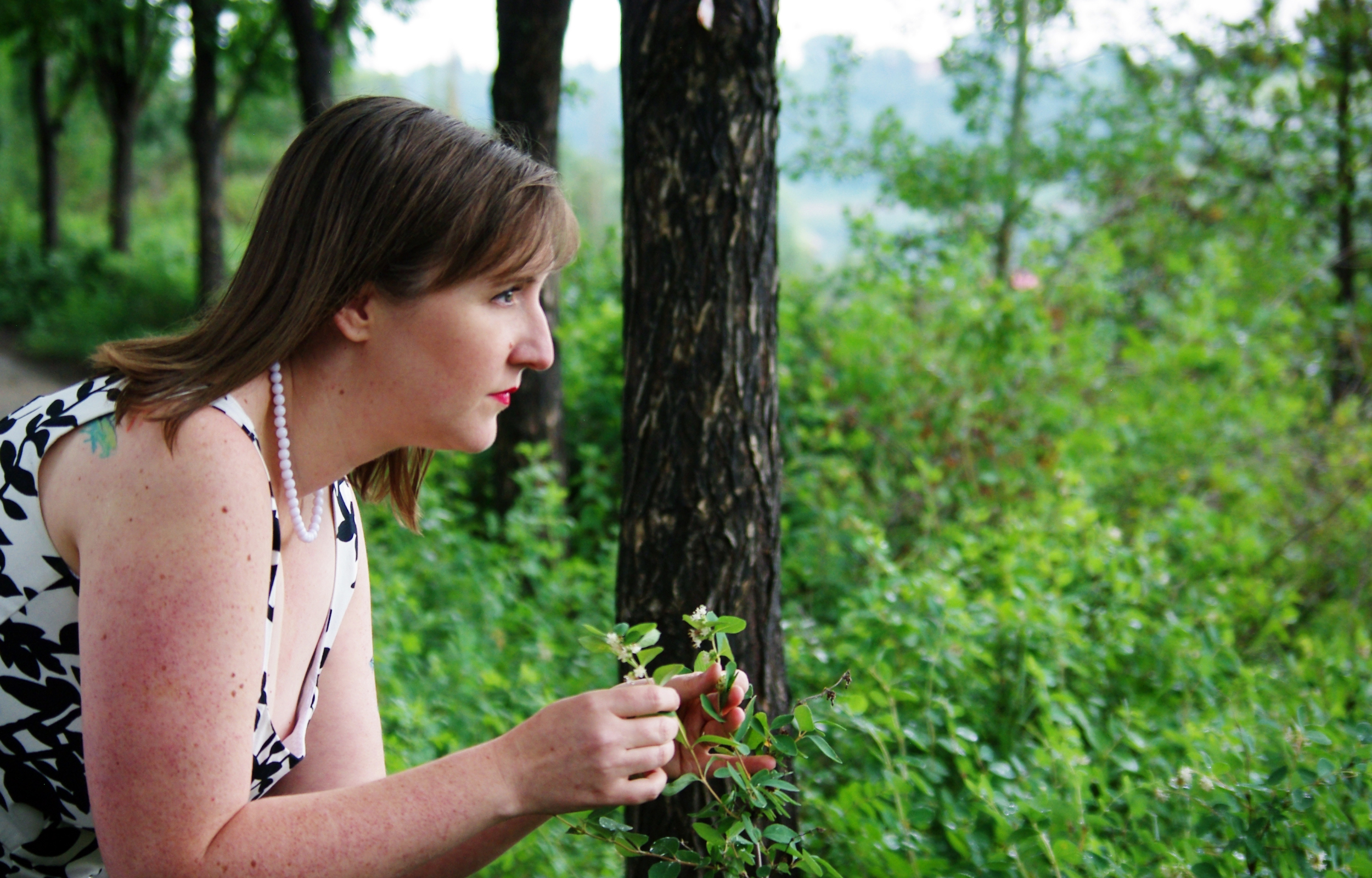 Antoinette picking herbs.jpg