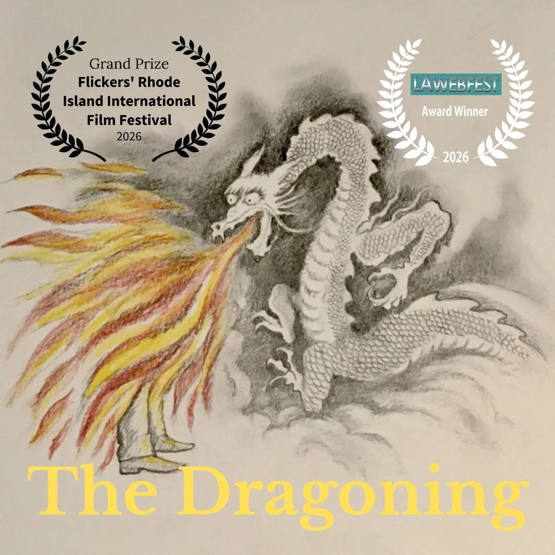 A dragon breathes fire. Visible below the flames, a man's legs.