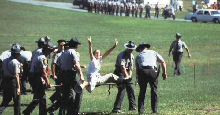 Ingrid arrested at pigeon shoot protest in PA Credit PETA.jpg