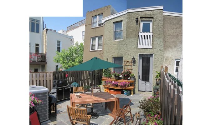 The rear patio began as a weed-filled dump for discarded building materials. The owners have transformed it into an outdoor entertainment space.
