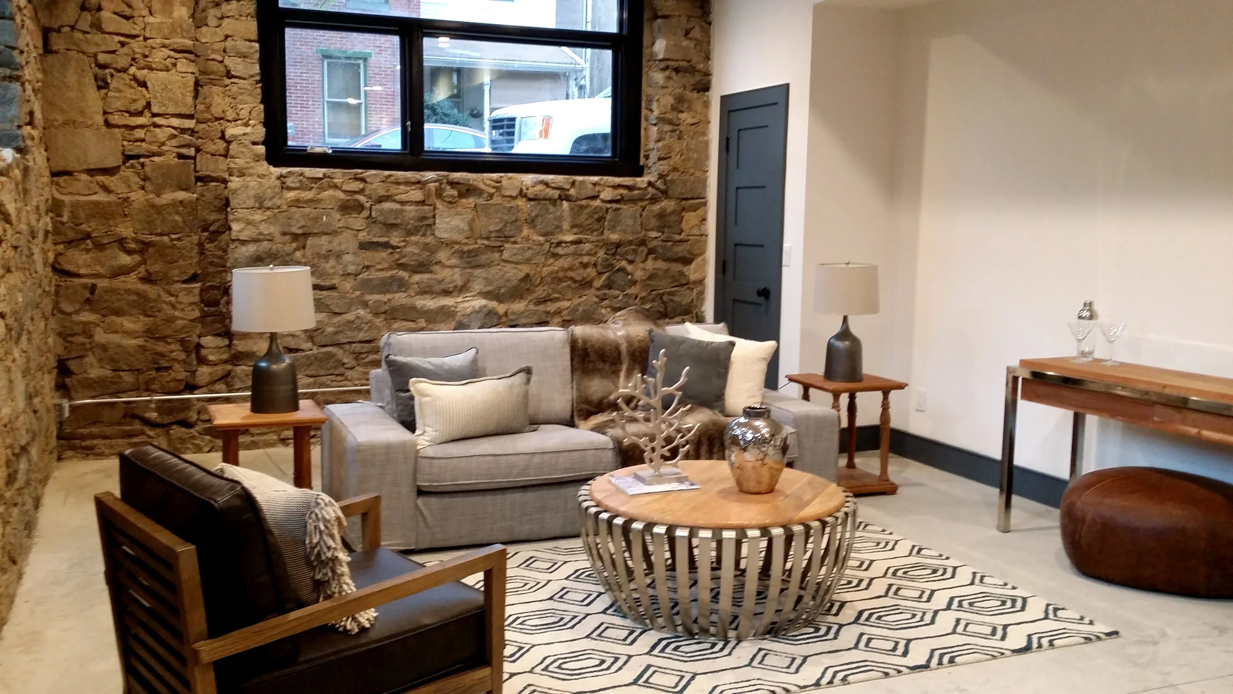 This is the "basement" living space. With ten-foot ceilings and large windows, it certainly doesn't feel underground.